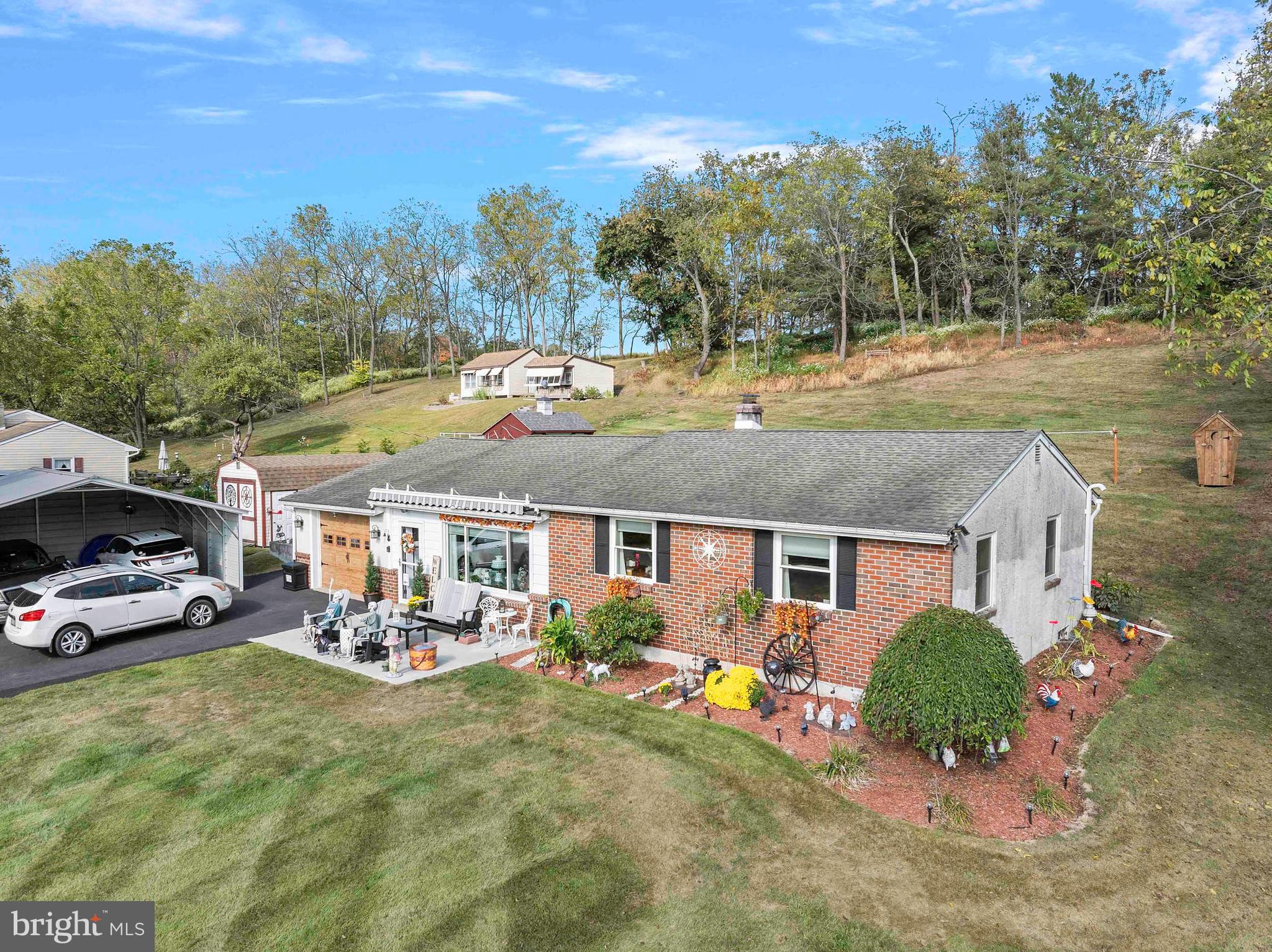 Have you been searching for the perfect home but have been coming up short? Just a quick drive from the Borough of Perkasie you’ll find this updated 3 bedroom Rancher with views of Pleasant Spring Creek from your front porch. Upon entry into the sunken living room you’ll notice that pride of homeownership is on full display with the many improvements that have been completed throughout the home. The kitchen has beautiful granite countertops, stainless steel appliances, pantry and showcases great views that overlook the rear deck. 3 spacious bedrooms and a recently renovated hallway bathroom round out the main floor. Downstairs you'll find additional living space in the partially finished basement, complete with recessed lighting and built-ins. The exterior has many options to enjoy the outdoors, whether it's having a meal under the pergola on the rear deck, enjoying a cup of coffee on the front porch or admiring your future flock of chickens from the side patio. This property offers it all, set on a parcel that transcends a private park-like setting. Call today to schedule a private showing.