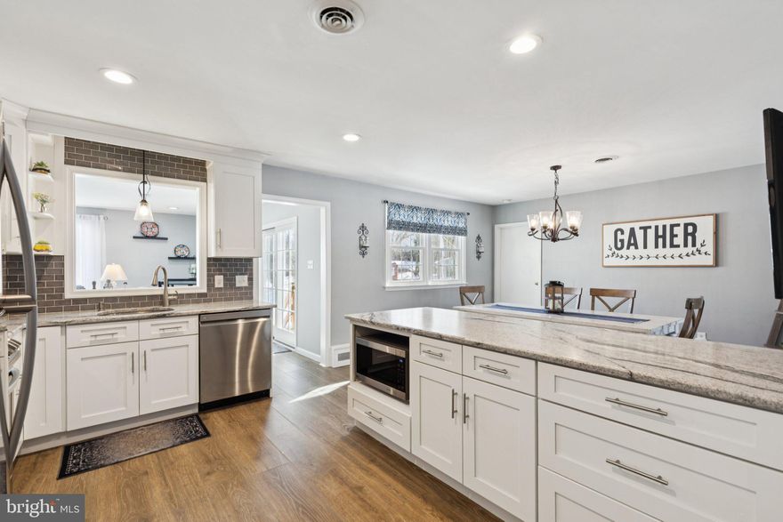 Discover the charm and convenience of this beautifully updated rancher at 404 Enfield Road in the heart of Oreland! This single-floor gem is the perfect blend of classic design and modern upgrades, offering a seamless lifestyle for today’s homeowner.

Step inside to find a thoughtfully designed layout featuring three spacious bedrooms, a dedicated office for your work-from-home needs, and a large family room addition that’s perfect for entertaining or relaxing. The updated kitchen (2018) is a true showstopper, boasting leathered granite countertops, white cabinets, stainless steel appliances, sleek finishes, and plenty of workspace for your culinary adventures. Both bathrooms received stylish updates in 2016, adding a fresh, contemporary touch.

You’ll love the neutral laminate plank flooring throughout, offering durability and a crisp, modern aesthetic. Sliding doors to the large deck off the back of the home invites you to unwind while overlooking the private backyard—an ideal spot for morning coffee or summer barbecues.

Practical upgrades include a brand-new roof (2020) and a new heater (2019), ensuring comfort and peace of mind for years to come. This home isn’t just a house; it’s a move-in ready haven waiting for its next chapter.

Located in a friendly neighborhood with easy access to local parks, schools, and shopping, 404 Enfield Road combines suburban tranquility with everyday convenience. Don’t miss the opportunity to make this stunning home your own!