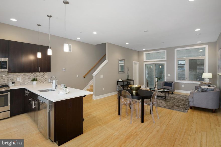 Where luxury and location meet, welcome home to Hope St. Just steps from the Market-Frankford line, enter the front door to reveal a spacious living room and connected gourmet kitchen featuring sleek counters, top of the line stainless steel appliances, and gorgeous European cabinetry. Through your kitchen sliding doors you will find a conveniently placed rear patio area as well. Then make your way upstairs to find two well-proportioned bedrooms and accompanying spa style bathrooms. The third floor master suite is where you will really fall in love. Outfitted with a gorgeous luxury master bathroom (with open glass shower), huge walk in closets, and enough space to fit a king size bed you will find it difficult to ever leave! Don t forget to take a trip downstairs to the full size finished basement with in unit W/D. Also featuring built in security system, and reserved off street parking. All square footage numbers are approximate and include above and below grade square footage. Square footage should be verified by the buyer. It is the responsibility of the buyer to verify real estate taxes.