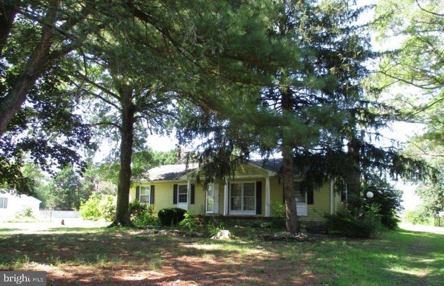 REDUCTION:  30797 Dagsboro Road is located in a "country" setting, but only minutes away from shopping, entertainment, restaurants, etc.  This property offers 3 bedrooms, 1.5 bathrooms with living & dining rooms, kitchen, family room, laundry room, etc.  There's a large front porch and back sun deck not to mention 2 storage/shop buildings, etc. This home comes equipped with solar panels on the back roof to help with cost. The solar panels are leased through Solar City. Plenty of sunshine for gardens and room for outdoor toys and parking.  Time to take another look; this property is back on the market.  Call you agent now!