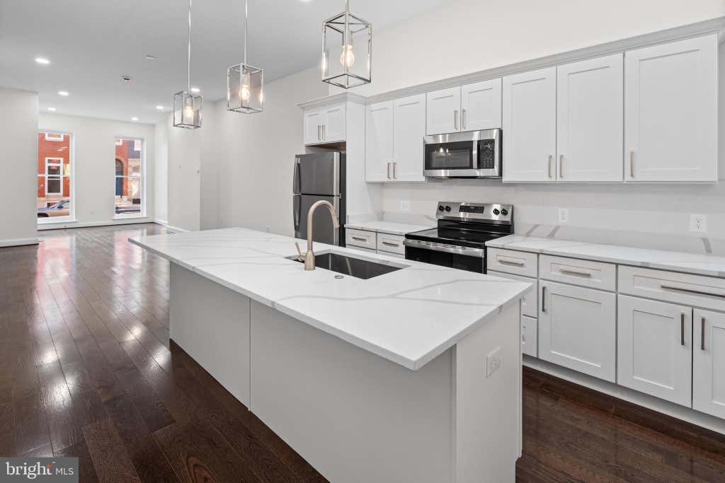 Photo of 530 N Carrollton Avenue, BALTIMORE, MD 21223 (MLS # MDBA2226872)