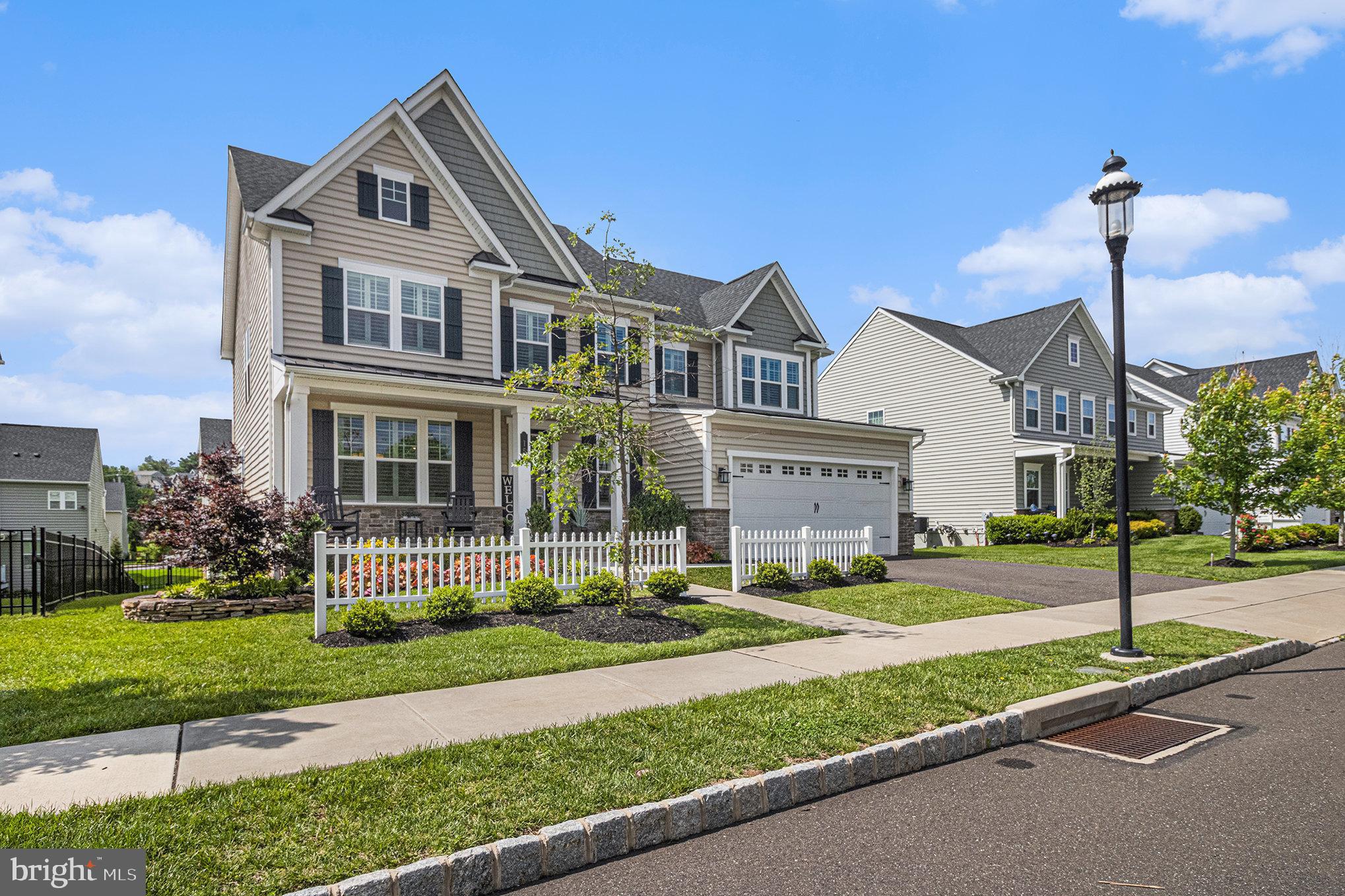 Welcome to 15 Ruthies Way, Chalfont, PA 18914—a meticulously crafted Colonial-style residence built in 2020. This NV built home offers approximately 4,488 square feet of living space, including a finished basement (700sf) , (MAIN FLOOR has 1 FULL Bath and BONUS Room for Bedroom or Office) all in the sought-after Chalfont View community.
Upon entering, you're greeted by gleaming hardwood floors that flow seamlessly throughout the main level. The formal dining room, adorned with crown molding, provides an elegant space for gatherings. The open-concept design connects the dining area to a chef’s kitchen, featuring black cabinetry, granite countertops, stainless steel appliances—including a double oven—a large center island, and a spacious walk-in pantry. Adjacent to the kitchen, the great room boasts a gas fireplace and abundant natural light, creating a warm and inviting atmosphere.
The first floor also includes a mudroom with built-in seating and storage, a home office, and a half bath. Upstairs, the expansive primary suite offers a tray ceiling, two walk-in closets, and a luxurious en-suite bathroom with a double vanity, soaking tub, and walk-in shower. Two additional bedrooms share a Jack-and-Jill bathroom, while a fourth bedroom features its own private bath. All bedrooms are equipped with walk-in closets. A conveniently located second-floor laundry room includes a sink and storage space.
The finished basement provides high ceilings, a full bathroom, and versatile space suitable for a family room, game room, or gym, along with ample storage areas. Outdoor living is enhanced by a covered front Custom Stone Porch and a rear composite deck and vinyl railing, overlooking a fenced backyard.
Additional features include a 2-car garage with inside access, a smart home system, and a 2-zone HVAC system for efficient climate control. Located in the charming and historic community of Chalfont Borough, this home offers convenient access to the SEPTA train station via a community walking trail and is close to Routes 202, 309, and 611. Enjoy the nearby town of Doylestown, offering a variety of museums, restaurants, and shopping options.
This property combines modern amenities with classic design, making it a move-in-ready home in a desirable location.