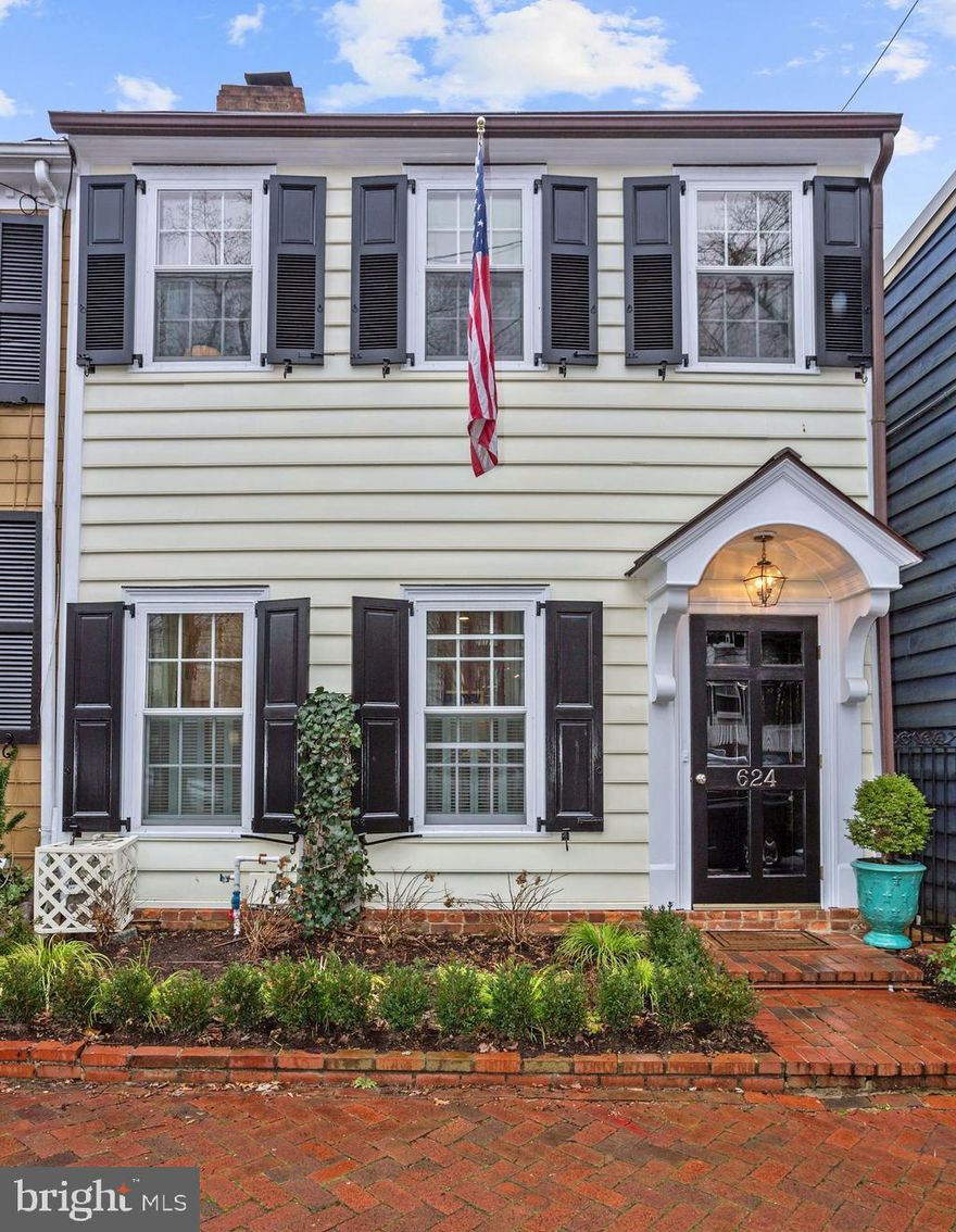 The last quarter of the nineteenth century saw a slow resurgence of building and life in Alexandria after the War Between the States.  Dwelling houses for smaller families were in greater demand and pockets of building emerged within the city limits.  The 600 block of South Saint Asaph Street was the welcome location for a number of these homes, including the clapboard structure at 624 South Saint Asaph Street. Today, it is a sophisticated residence with generous sized rooms, tall ceilings, wood or brick floors, two fireplaces, glorious built-ins and extensive decorative detail. Yet it also includes the surprise of a roof-top terrace from which you can view the cityscape from on high and a charming enclosed garden with brick and slate patio permitting total relaxation and a snippet of gardening for the green thumb in you.  Off-street parking adds to the delights of this period home where the present owners have lovingly and successfully brought it into the twenty-first century.. Gracious formal rooms lead to the masterful kitchen with sleek counters, glass-front cabinets with lighting, warm wood cabinets for culinary necessities and recent appliances.  Beyond is a truly inviting family room with custom book shelves and wondrous light while three large bedrooms await upstairs. Bragging about the improvements is easy, starting with the true, divided light high-efficiency windows, the crisp exterior painting, custom woodwork and stair to the loft, replaced roofing and roof-top deck.  Even the kitchen and bathrooms have been renovated! But don't miss the irrigation systems in the front and rear gardens assuring plenty of TLC for all the plantings. Super location!  The shops of South Washington Street, Balducci s, Patina, the Old Town Safeway and more are within a stone s throw with the Lee Street Park amusing children just a few blocks away. Don't hesitate! Move in!  You will love it all!  SELLER TO PROVIDE A $7,500 DECORATOR'S CREDIT.
