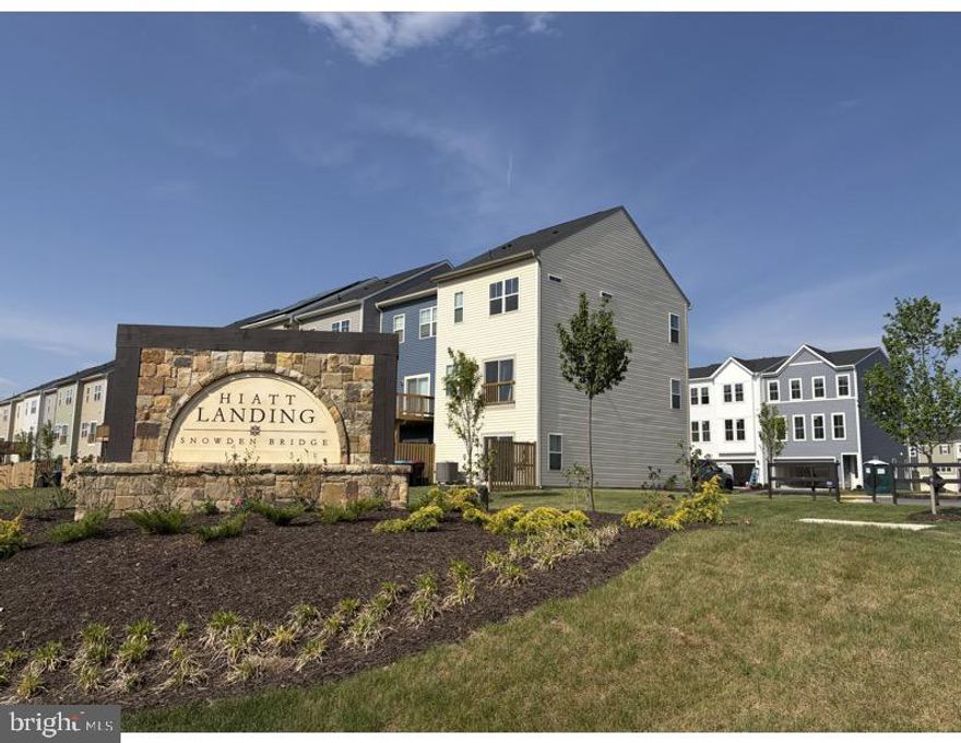 Fantastic 4-bedroom end-unit townhome with exceptional community amenities! Luxury vinyl plank flooring flows throughout all three levels. The gourmet kitchen is the heart of the home, featuring white Corian countertops, an oversized island, ample seating, gas cooking, a deep sink, stainless steel appliances, a pantry, and a separate breakfast area with mountain views. The open layout flows seamlessly into a sun-filled family room with large windows and a ceiling fan. Upstairs, the spacious primary suite features a walk-in closet and a spa-like en suite bath with a soaking tub, separate shower, and dual sinks. Two additional bedrooms, a full hall bath, and convenient upper-level laundry complete the bedroom level. The walk-out lower level offers a 4th bedroom or versatile recreation space, along with a half bath, closet, and storage. The home also includes a one-car garage with opener. Located in an amenity-rich community offering a 15,000 sq. ft. indoor sportsplex, private splash park, bike track, swimming pool, picnic pavilion, trails, dog park, on-site elementary school, and day care center. A wonderful home with space, comfort, and lifestyle amenities all in one!