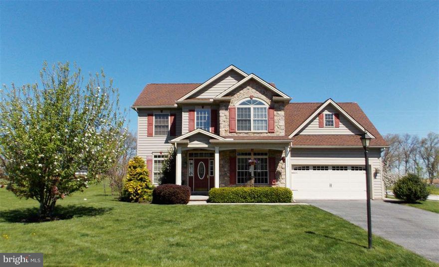 Absolutely Gorgeous Former Model Home Loaded with Upgrades! Home Features Living Room with Fireplace, Dining Room with Wainscotting and Wood Floors, Kitchen with Upgraded Cherry Cabinets, Dining Area Opening to Large Deck, Master Bedroom with Vaulted Ceiling, Master Bath with Jacuzzi Tub & Separate Shower, Three Other Spacious Bedrooms, Finished Basement, Plenty of Storage, Two Car Garage, and HUGE 1/2 Acre Level Lot!