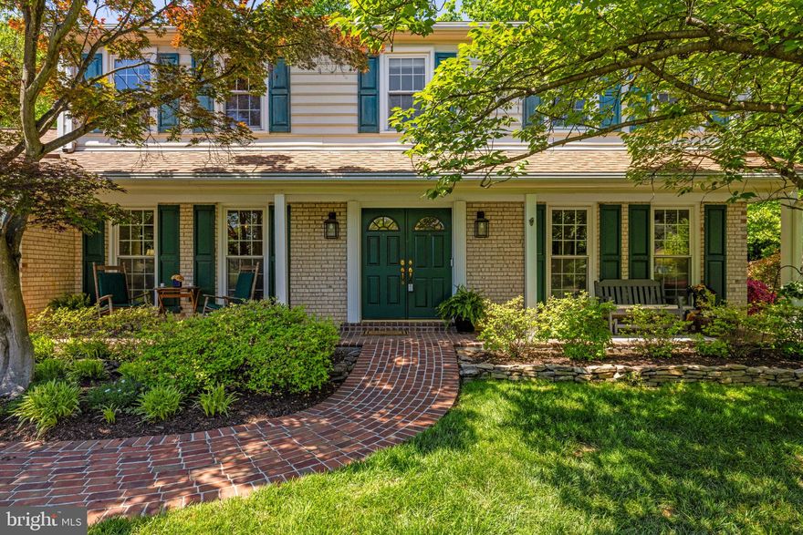 Welcome to 9716 Bunchberry Place, a beautiful, brick, center colonial home situated in the back of a very flat, quiet cul-de-sac in the highly desirable Vienna Oaks community. A tasteful, brick walkway leads to the front double doors where the center foyer invites you to explore the timeless serenity of this house. 
The center foyer is flanked on the right by a formal living room and on the left by a formal dining room. Both rooms have beautiful, hardwood floors and ample windows that allow generous amounts of natural light.  Enter the cheery, white kitchen from the dining room where you’ll find contemporary-styled cabinets and attractive, coordinating countertops.   The eat-in-kitchen space allows a comfortable, casual eating area.  Bay windows in the eating area let in the natural beauty of the vast, meticulously designed and manicured backyard - creating a private, serene surrounding.  A small shed in the backyard keeps all yard maintenance handy! The family room with a brick fireplace and floor-to-ceiling built-in bookshelves makes this space a cozy retreat when relaxing or entertaining. From the family room, enjoy the huge, solid wood deck , great for cook-outs and gatherings, encompassed by the beautifully manicured  gardens to allow privacy - a haven for family, friends and entertaining
The upper level includes 4-bedrooms with a massive  primary suite. The primary suite has an adjacent office/sitting room area for a convenient work-from-home space. . The dressing room area contains a large vanity,  and  a separate, walk-in closet leading to  the ensuite bathroom with a tub and  stand-up shower!  Beautiful hardwood floors cover the primary suite and the attached office area.  Store your favorite wool sweaters in the  large, cedar-lined closet in the office area!  All 3 guest bedrooms are generously-sized and carpeted with underlying, pristine hardwood floors. 
With over 1,200 sq feet in the lower level, partially finished, the possibilities are endless to finish this space!  A wood-working area for the handy DIY-er is spacious enough for tools, equipment and materials.  The finished section can be a play area, man-cave, family room, golf simulator, game room or movie room - all within the realm of possibilities!  Lennox HVAC, system and Bradford White Water Heater.  All major systems are newer and/or well-maintained!
Major commuting routes are just minutes away: I-495, I-66, Fairfax County Parkway, Chain Bridge Road and the Vienna Metro.  Make this house your home!