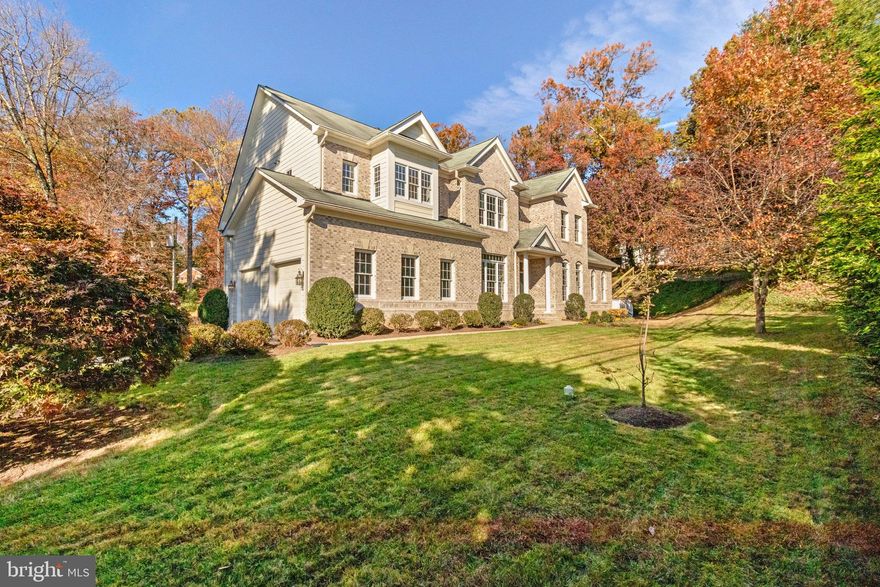 Are you in search of a newer, stunning open-concept home that offers proximity to all your needs? Look no further! This fantastic home is perfect for entertaining, boasting spacious living areas that flow seamlessly to a beautiful wrap-around deck featuring three convenient access points and one gate takes you up the steps to a private upper yard perfect for a fire pit. As you step into the entrance foyer, you'll be greeted by an expansive main level with 10 foot ceiling height. To your left, an office awaits with true divided lites French Doors and brand-new carpeting. On the opposite side of the foyer, the Living Room boasts hardwood floors and an abundance of natural light, thanks to the adjacent Conservatory with ten double-hung windows that provide captivating views of the wrap-around deck and professionally landscaped hillside.
Continuing through the main level, you'll find the Dining Room, which conveniently opens to the deck, and the gourmet kitchen. The Kitchen features an island with a GE Profile 5-burner natural gas cooktop and downdraft exhaust vent, granite countertops, a Samsung French door refrigerator with ice and water dispenser in the outside door, a GE Double Oven, built-in GE Microwave, and a Maytag stainless steel dishwasher. An adjacent Breakfast Room with hardwood floors leads to a grand two-story Family Room with new carpeting, a gas fireplace, French Doors to the rear yard, and a rear staircase to the second level. Completing the main level is a private half bath and an expansive attached two-car garage.
Moving on to the second level, you'll find generously proportioned hardwood-floored landing and hallways and 9 foot ceiling height, a laundry area with a Whirlpool Dryer and Samsung Washer, and three secondary bedrooms. Two of these bedrooms share a "Jack and Jill" bathroom with a double vanity and a tub/shower combo, while the guest bedroom enjoys an en-suite full bath with a tub/shower. The spacious Primary Suite features a sitting area, ceiling fan, a large walk-in closet with a window, and a spa-like bathroom with a Kohler oversized whirlpool tub, separate shower with a seat, double vanities, and a private water closet. All the bedrooms have outfitted with fresh new carpeting.
The lower level is fully finished and includes two full baths, one with a shower stall with a seat in it, and the other with a tub/shower combo. It also features a large Recreation Room with a rough-in for a wet bar and another secondary Recreation Room that could serve as an excellent Media/Theater Room. Additionally, there are two more unofficial bedrooms, both connected to full baths, and one room that would be ideal as an Exercise Room with durable laminate flooring. The remainder of the lower level showcases newly installed carpeting, and there's a private walk-up entrance from the Recreation Room to the exterior.
This home is situated in the sought-after Woodson High School district and offers easy access to Wakefield Elementary School (walkable). It's also conveniently located near I-495 and I-95, adjacent to NOVA Community College, and provides quick access to local parks for leisurely strolls or jogging alongside the serene Accotink Creek.