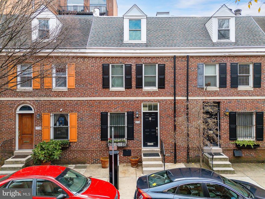 You've waited long enough for a home in Rittenhouse Square with multiple DEEDED PARKING SPACES and in the GREENFIELD SCHOOL CATCHMENT! Welcome to 1730 Lombard Street—a stunning, renovated Rittenhouse home that blends timeless charm with modern upgrades. Offering 2 CAR PARKING this bright and sunny 3-bedroom, 2.5-bath home with a classic brick façade is situated on a picturesque, tree-lined street in one of Philadelphia’s most sought-after neighborhoods. This home has been thoughtfully upgraded with all-new 3/4-inch white oak hardwood floors throughout the upper levels​ and engineered hardwood on the basement level, bringing warmth and elegance to every room. The bathrooms feature brand-new fixtures and flooring, while the kitchen boasts all-new​er custom cabinet​ry, perfectly complementing ​the granite counters, and functional layout. A newer washer and dryer and a newer roof provide additional peace of mind, ensuring this home is move-in ready. Enter through the front door to a light-filled open floor plan, where a south-facing wall of windows floods the space with natural light and offers a stunning view of the​ large brick patio. The pristine white kitchen features a large window overlooking Lombard Street, granite countertops, custom backsplash, pull-out shelving, soft-close drawers, and an upgraded KitchenAid appliance package. The kitchen flows seamlessly into the dining area and spacious living room, which boasts a feature wall of custom cabinetry, a built-in workspace, and a cozy gas fireplace with marble surround.​ Step outside to the patio, complete with shrubs, a flowering tree, and plenty of space for private dining, entertaining, or gardening. The second-floor ​Primary suite is a serene retreat, with large south-facing casement windows, an expansive walk-in closet, and a luxurious en suite bathroom. The bathroom has been upgraded with new fixtures and features a large walk-in shower with a seamless glass enclosure, custom tile work, double vanities, and custom mirrors. An extra-wide hallway provides space for a seating area or workspace, with a window overlooking Lombard Street. The third floor offers two additional spacious bedrooms, each with ample natural light and closet space​ and city skyline views from the front bedroom. A newly updated full bathroom with a tub and custom tile work completes this level. The finished walk-out lower level is a versatile space, ideal for a second living room, home gym,​  playroom​ or guest suite. Sunlight streams through the windows and door leading to the patio, making it feel bright and open. This level also features a ​beautiful powder room, a large laundry room with an extra-large capacity washer and dryer, and additional storage, including a closet under the staircase. Located just steps from the best of Rittenhouse Square, including world-class dining, shopping, and cultural attractions​ and easy access to Schuylkill River Park, Upenn and Drexel by following Lombard Street over to the South Street bridge. 1730 Lombard Street is a rare find in today’s market. Don’t miss your chance to call this beautifully updated and meticulously maintained home your own!