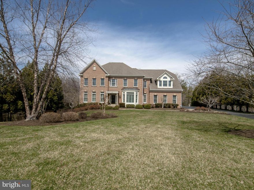 Perfectly gorgeous colonial on cul-de-sac and 83 acre lot backing to trees with spacious rooms, 2-story foyer, hdwds on main lvl, gourmet kit w/ brkfst area, 2 gas FP, lovely back deck w/ pergola, 2 HFBAs, MBR suite & 3 BRS up, LL w/ game rm & wet bar, 5th BR/Au Pair Suite,. 3 car gar.Best times to show are 9-10 and 4-6 due to VERY friendly retriever.