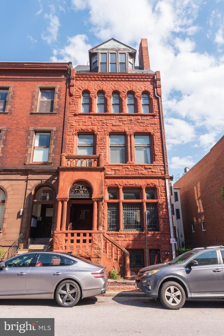 823 Park Ave is one of the most unique and spectacular properties in the Historic Mt Vernon neighborhood of Baltimore City. Not only does this property include a Home Office on the First Level along with 5 apartment units, it has the most amazing owners unit comprising approx. 3,400 sq. ft. on three upper levels and a 6th floor deck with unobstructed 270 degree views of the Baltimore skyline. The building contains approx. 8,400 sq. ft. of above grade area, and approx. 1,500 sq. ft. of finished lower level storage/utility space and a studio apartment.  The spectacular owner's unit has the following features • Approx. 3,400 sq. ft. of living space • Two bedrooms and 2 1/2 Bathrooms • 2-story Atrium Entertainment area with floor to ceiling windows • 30' Kitchen and Breakfast Area • Approx. 600 sq. ft. Family Room with Accordion Glass Doors opening to a Spacious Deck with 270 degree panoramic views of the Baltimore skyline. Value-Added - There are 5 Rental Units with Two 2-BR and Three Studio Apartments. Not including a vacant 2BR unit, the remaining 4 units have a total monthly rental of $4,495. The fair economic rent of the 2BR units is $1500-$1700/month.  There is a lot of upward potential for the monthly rent income, which should be approx. $6,500/month.  The owner's unit should rent for $4,000-$5,000/month. 
There is also potential to rent the first floor owner's office for $1,500-$2,000/month.  Overall, the building has potential monthly rental of $12,000-$13,000/month. Renovations and Updates: The building was completely updated and renovated with the following features • 600 amp electric service • 56 new windows • New plumbing and feeder lines • New Bathrooms • New kitchens  • Separate gas and electric meters • Sprinkler system throughout the building • Carport parking for 2 vehicles • Large rear brick patio.