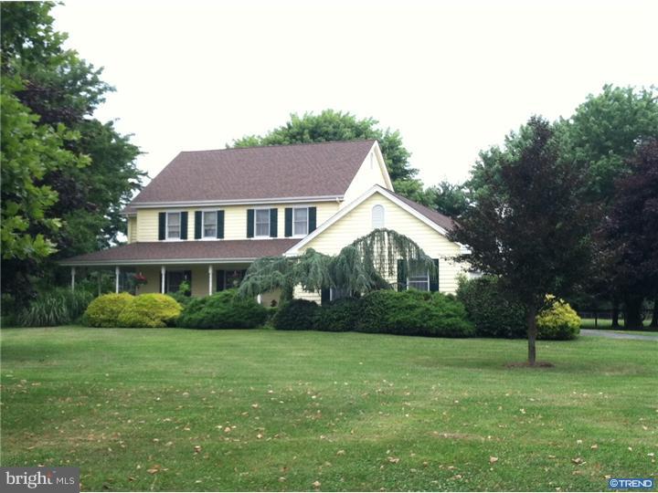Rarely does a home that is this lovely and well prepared for the market come along in such a picturesque setting at this price point. This lovely Farmhouse style home on 1.7 acre lot is situated adjacent to a small farm and overlooks part of a Pennsylvania Conservation area. There are beautiful vistas from every window. Your first experience will be stepping on to a wrapped around porch to the front door and entering into this immaculate home.  Entry foyer is accented with hardwood flooring that flows into the living and dining rooms that are brightened by an abundance of natural light. The totally renovated kitchen with a convection oven, stainless steel appliances and natural cherry flooring is a "cooks" dream. There is more than ample cherry custom cabinetry, a tile back splash, exquisite granite tops plus a large dining area that overlooks the beautiful backyard. The step down family room is open to the kitchen and has a brick fireplace and natural cherry flooring to enjoy on a winter's night. Hardwood stairs and hallway will lead you to the upper level. The main bedroom is accented with a circle top window, vaulted ceiling, lots of natural light and a luxury bath with whirlpool tub, separate shower and double vanity. There are 2 other lovely bedrooms and full bath plus an open sitting room. Easy access to attic on wide stairway. The added bonuses and updates include a new roof with transferable warranty (2013), HVAC 2010, powder room, laundry/mudroom with porcelain tile, all in immaculate condition, and a stamped concrete patio with an elegant design and stone wall. Situated in a small community of only thirteen homes, this is truly the house you will want to call home.