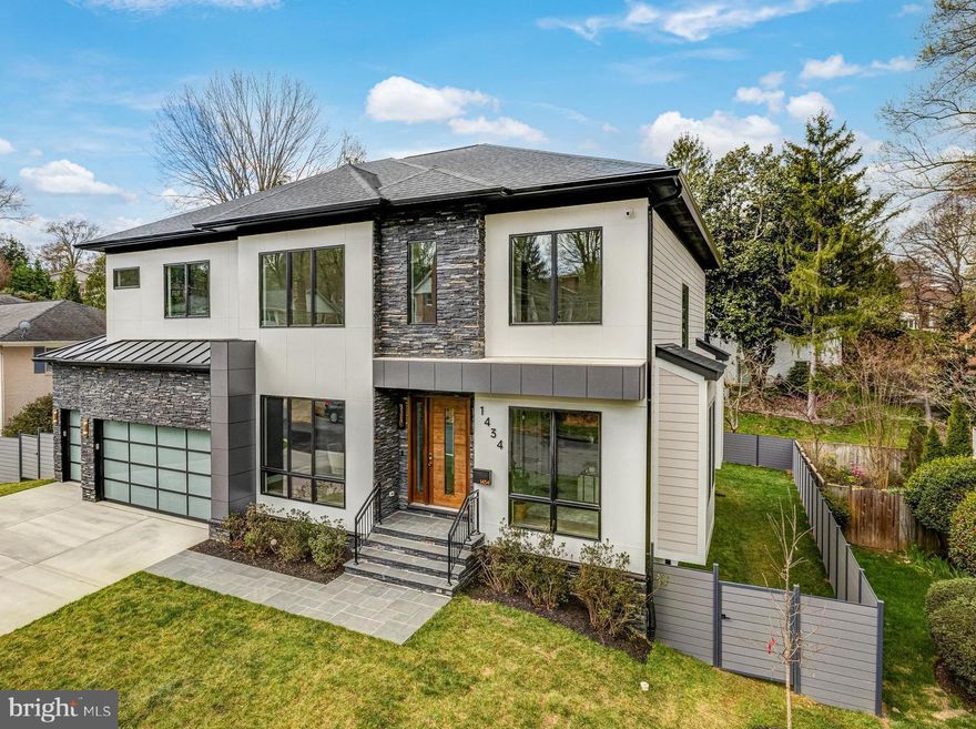 This spectacular new build from Kul Homes, McLean's premier luxury spec home builder, is intelligently-designed with 6 bedrooms, 6 ½ baths and over 7,000 sq ft of living space. The home is expertly sited on a premium 0.24 acre lot with a fully fenced backyard. The home features a 3-car garage, 10’ ceilings on main and upper levels, oversized windows, upgraded crown molding and trim, numerous custom built-ins, designer light fixtures, and wide-plank white oak engineered hardwoods. 

Entering into the spacious foyer of this elevator-ready home with main level ensuite bedroom, reveals an open floor plan featuring a light-filled family room with a gas fireplace, a home office/study, and an elegant dining area which connects to the gourmet kitchen through a well-appointed butler’s pantry. The spacious kitchen with inset cabinetry, Thermador appliances, including built-in coffee maker, has an oversized center island with second sink, second dishwasher and space for 4 stools, as well as a large breakfast area. Direct access to the media-ready screened-in porch with a fireplace that connects to a large deck, with stairs to the lower slate patio. 

The upper level features 4 ensuite bedrooms, a well-designed laundry room and a flex room, ideal for a home office, playroom, study or exercise studio. The spacious primary suite includes a sitting area with a gas fireplace, beverage station and access to the large balcony. Just past the dual walk-in closets with floor-to-ceiling custom cabinetry, the luxurious primary bath offers a walk-in steam shower, freestanding tub and dual sink vanity. 

The lower level has an open rec room with a gas fireplace, wet bar, media room, exercise room, and a guest room with walk-in closet and an ensuite bath. McLean High School pyramid; minutes to downtown McLean and Tysons, with easy access to major commuter routes.