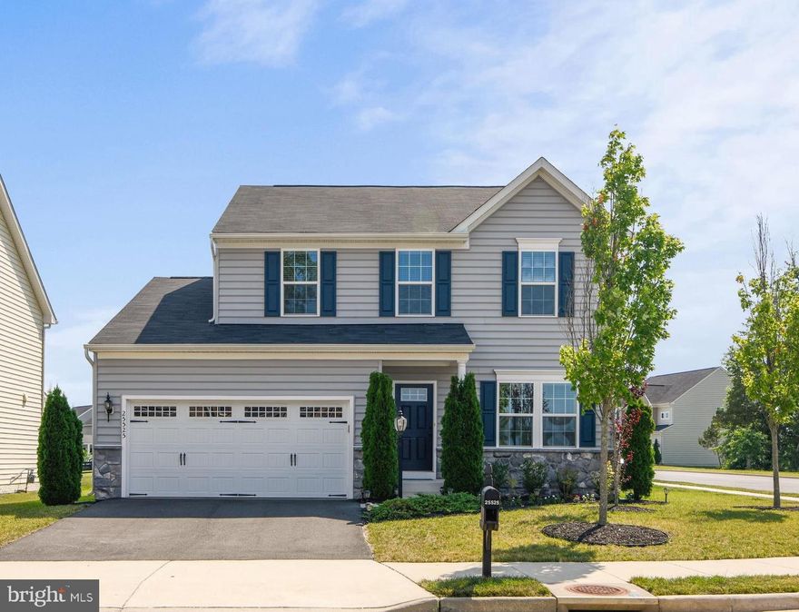 Pretty as a picture and located across from wooded corner common ground!!!  Stone and siding is immaculately maintain and the pickest buyer can move right in!  Three finished levels include 4 bedroom, 3 1/2 bath.  Center island kitchen with granite counters has it all...stainless steel appliances, tall cabinets, center island eating space, gas cooking, walk in pantry and double sink overlooking fenced yard!  Dining area adjacent to kitchen has steps leading onto patio for those wonderful family barbecues!  Wood floors in kitchen, dining room and foyer.  New neutral carpet in living room and family room.  Family features a gas log fireplace with remote and ceiling fan.  Upstairs affords roomy bedrooms for all with two full baths.  Master Bedroom Suite has window on two sides, walk in closet, new carpet and a full luxury bath with separate shower, soaking tub, and dual vanity and ceramic tile flooring.  Three generous sized bedrooms include nice sized closets and share a hall bath with ceramic tile flooring.  Lower level is the bomb!  Families will LOVE spending time in this cool area with a full movie theatre which conveys!!!  There is office space in the area, full bath, storage and storage closet.  Currently, the owners have an exercise area in the unfinished storage room.   All windows are fitted with custom white wood blinds!  Washer/Dryer  new 12/2019***Carpet in LR, FR, Green BR, MBR in 07/2020***Fresh Paint LR, Halls, FR, Kitchen, DR***2/2020 Moen Touchless Kitchen Faucet***2x6x4 Herb garden with basil, sage, oregano, rosemary,thyme, chives, green onion, cilantro, chard and kale***20 X 16 Stone patio with custom steps from Dining Room***4 foot tall wood paddock fence wih black wire mesh encloses the rear yard***HOA includes 4 playgrounds, swimming pool with kiddie pool (must buy season pass $15 per family)***tennis courts***nature paths***community gym and club house***This is one home that will not disappoint!  Show with confidence and please observe all COVID-19 precautions.