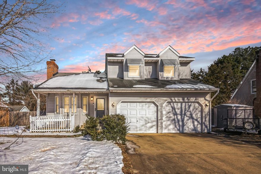 Discover this charming colonial home featuring 3 bedrooms, 2 full bathrooms, and 1 half bathroom, all nestled in a quiet and friendly community.

This cozy 2-story home exudes warmth and character, starting with the inviting front porch—perfect for morning coffee or evening relaxation. Inside, the spacious living room features a beautiful fireplace, creating a cozy retreat for chilly evenings.  Stay cool with central air conditioning and enjoy the convenience of the attached 2-car garage, providing ample parking and additional storage.

Step outside to a large, level backyard, fully fenced for privacy and safety—perfect for entertaining, gardening, or playtime. The backyard also features two storage sheds, offering extra space for tools, hobbies, or seasonal items. An additional paved parking space provides even more convenience for guests or multiple vehicles.

Located close to shopping, top-rated schools, and major commuter routes, this home offers the perfect balance of charm, functionality, and convenience. Don’t miss the opportunity to make it yours—schedule your showing today!