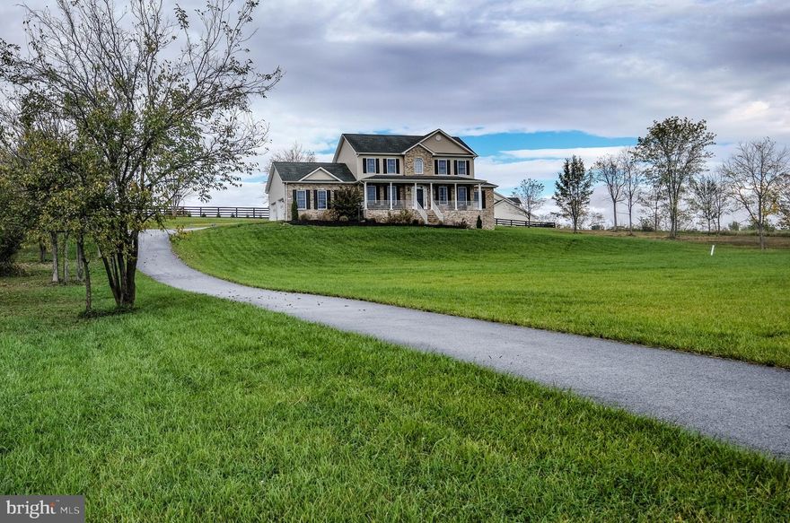 Welcome Home To This Amazing, Open Spacious Colonial, On 2.10  Unrestricted Acres  Just Outside Of Winchester On Apple Pie Ridge Commuter Routes 81 And Route 37 Are Within 15 Minutes!  Views, Quiet, Covered Front Porch To Sit And Relax!   This Quality And Custom Built Home On Apple Pie Ridge Wont Disappoint! The Main Level Of The Home Boasts An Open Foyer, Formal Dining Area Off Of The Kitchen, Living Room,  Main Level Master Bedroom Has Amazing Space And An Impressive Primary Bathroom.  Also  Open Kitchen With Many Cabinets, Granite Countertops, Pantry, Stainless Appliances, The Entire Main Level Has Hardwood Floors And Tile In The Bathrooms! Custom Built From Top To Bottom! The Upper Level Of The Home Has Another Primary Bedroom With A Full Bath,  Full Bedroom And 1 Office/Additional Bedroom Space, Washer And Dryer On Located In the Hallway, Wall To Wall Carpet, Amazing Views From This Level! The Basement Is Unfinished And Ready For The New Home Owner To Complete!  Would Make A Great Theater Room Or Large Recreation Room! You Must Remove Your Shoes Before Touring Or Wear Shoe Covers And Make Sure To Lock All Doors, Leave Home As You Found It!