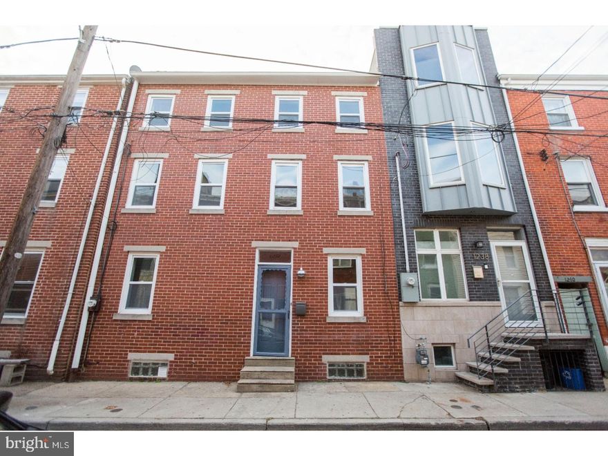 Three story home for AVAILABLE NOW in the epicenter of Three of the City's most vibrant neighborhoods. Steps from Northern Liberties and Fishtown with easy access to Center City. The home is a short four-minute walk to the Market-Frankford Line Girard stop. You can walk to all of the amazing new social venues, shopping, fine dining, cafe's and a plethora of restaurants. Enjoy close proximity to Frankford Hall, Johnny Brendas, La Colombe, the brand new City Fitness, The Fillmore Philadelphia!  The house is newly renovated and has four bedrooms, one large bathroom, eat-in kitchen with brand new cabinets and counter tops, a beautiful professionally landscaped rear yard, and a washer/dryer in the basement. Ample street parking is available. First and last month's rent plus a $2,400.00 security deposit must be paid upfront at lease signing. Tenants are responsible for all utilities.