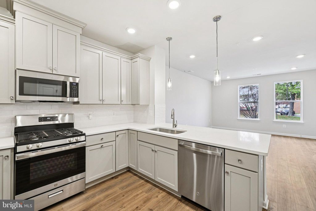 Photo of 19566 Village Walk Drive, MONTGOMERY VILLAGE, MD 20886 (MLS # MDMC2222176)