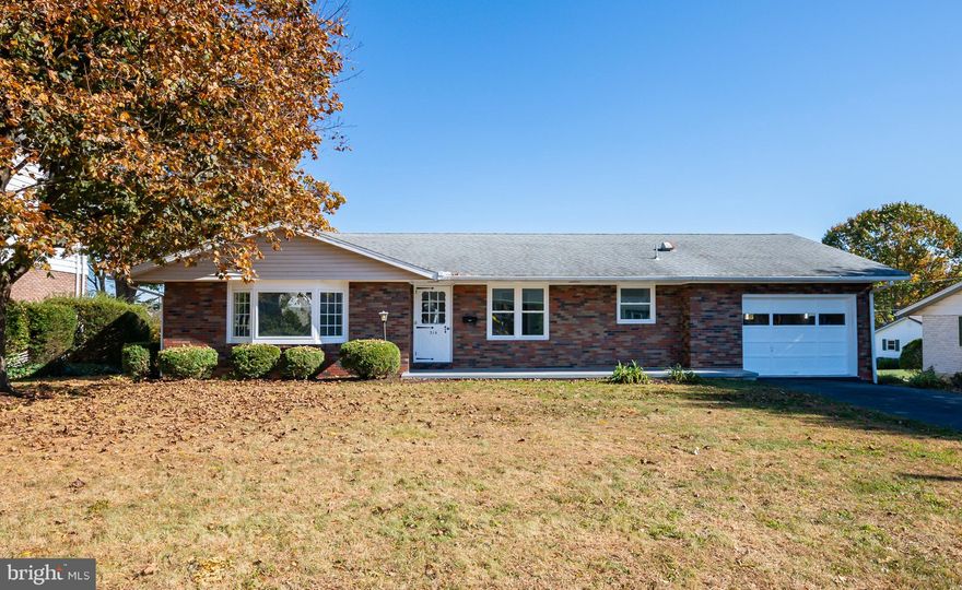 Fantastic brick rancher, just a few blocks from Kutztown University, offers convenience and style.  Completely remodeled with quality materials throughout, this one story home features a spacious living room with a large bay window that fills the space with natural light.  The open concept design flows into the beautiful modern kitchen with granite countertops, tile backsplash, farmhouse sink and stainless steel appliances.  The home has three bedrooms and three full baths, including a primary suite with a tiled surround shower with glass doors.  The fully finished lower level adds so much living additional living space.  This versatile area is perfect for a rec room or family room.  An additional room in the lower level could be an office or playroom.  A convenient full bath in the lower level has a tiled shower with pebble bottom.  With neutral colors throughout, the home will blend seamlessly with any décor.  This move in ready home offers modern comfort in a great location.  Main floor laundry, one car oversized attached garage, level lot, new heat pump and central air.  This home won’t last!