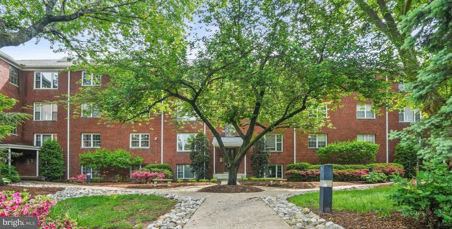 With the Rosslyn metro blocks away and 4th of July fireworks on display, this light-filled 2 Br/1 Ba 840 sq. ft. second-floor condo with-wow factor kitchen is the perfect spot to call home. Enjoy an open floor plan living/dining area w/recessed lighting + pristine wood floors overlooking a quiet treed courtyard.  Larger than what you would find in many SFHs, the kitchen is spectacular, with expansive quartz counters, high-end white wood cabinetry, SS appliances (gas range), and loads of light from a wall of windows facing Iwo Jima (and offering winter monument views). Each of the bedrooms provides ample closet space w/room for Queen/King sized beds. Bathroom has been updated w/marble floor tiles, new light fixture and stone-topped vanity. Newly painted throughout. Newer HVAC & windows (2020). Low condo fee includes ALL utilities (gas/water/electricity/trash). Parking is easy with 2-parking passes for the private surface lot.  Ample common laundry just one flight of stairs down, as well as bike storage and a separate sizeable storage unit that conveys (in building 1423). Pet-friendly building. No lights to downtown DC via Rte-50 just 1 mile away and steps to Orange Line corridor shops, restaurants and trails. You won’t find a better option in N. Arlington for the price!