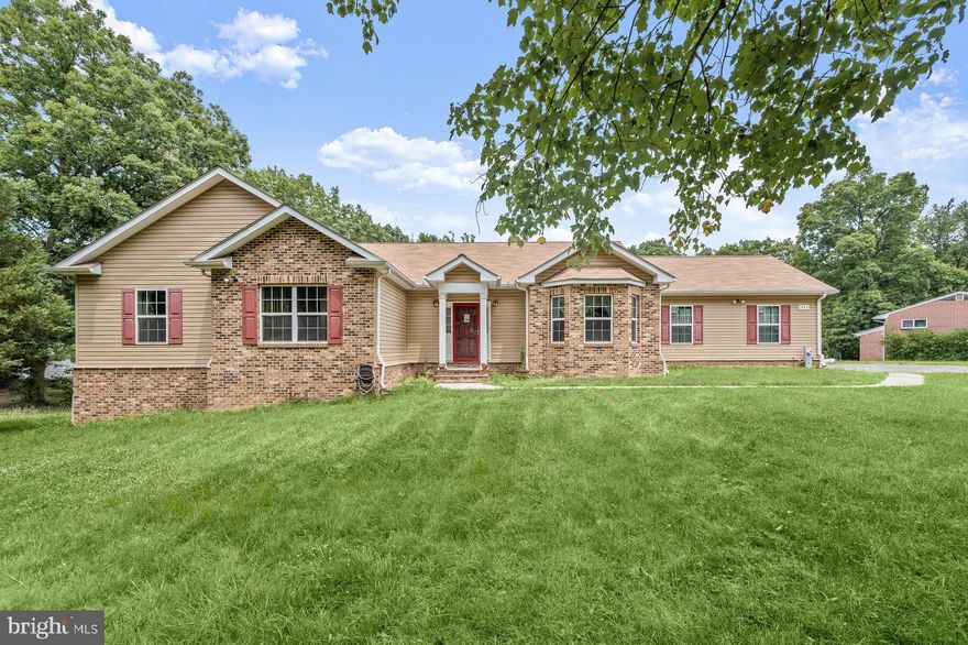 This home was uniquely and custom designed by the owner, all on one level, perched on just short of an acre (.93) of beautiful pastoral land. All of the outstanding features inside and outside of the home were either handmade, designed, or personally selected by the owner. All engineered hardwood flooring is present throughout the home. The kitchen features customized cabinetry, imported Italian Murano ceramic tile, quartz countertops and wrap around resin bar, with handmade light fixtures in the kitchen, dining room, and breakfast nook. The half bath boasts hand designed and created inlaid seashell and resin countertop with coordinating blown glass vessel sink, and handmade seashell light fixture. The full Guest bathroom presents textured ceramic tile, and the double vanity is styled from imported Acacia hardwood with carved Travertine marble vessel countertop and sinks. The Primary Ensuite features floor to ceiling porcelain tile in the 6ft double shower, and jetted tub enclosure, and separate water closet featuring ultimate privacy. Individual vanities are graced with marble and porcelain sinks round the ensuite. The house and property enjoy year-round unobstructed sunshine all around, perfect for growing indoor plants, or vegetable or flower gardening.