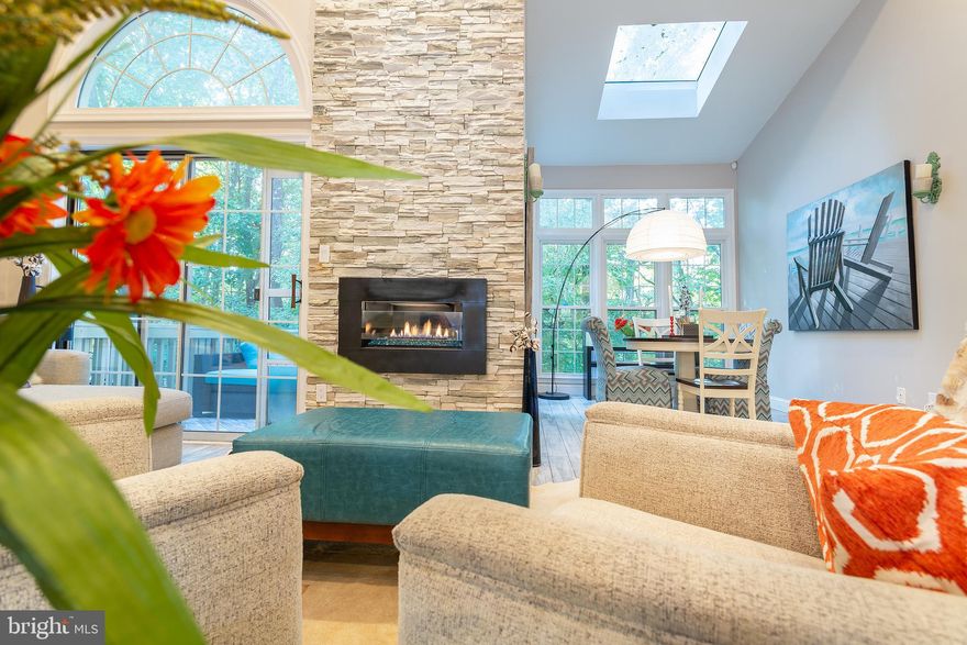 Way too many upgrades to name them all!!!  Including roof, fascia, soffit and gutter guards, Hardiplank, all new windows, new HVACs, new pipes throughout, hand painted white-washed hardwood floors on the main level and stairs, hardwood upstairs and laminate floors on lower level, matching hand painted wood deck floors, which extended from the living room, full updated open kitchen with granite counter tops, stainless steel appliances, five burner gas stove and customized white cabinets, large Master bedroom with vaulted ceilings and custom built in closets, all 3.5 bathrooms have been fully updated, with heated floors on the lower level and Master bathroom, Master bathroom has a electronic and toilet/bidet with heated seats, contemporary fireplace with cobalt blue gas stones encased with blonde stacked stones mantel from floor to 15 foot ceiling and woodburing fireplace on lower level, separate ductless HVAC on lower level, new garage floor with extra storage system, pully system for two bikes, gas line for grilling on a private enclosed pavers patio, At the end of the cul-de-sac backs to a treed lot with tons of walking trails and a pavilion, minutes to heated spa and pool, dog park, shops and restaurants, schools, and a short drive to Reston Town Center, Hospital, Dulles Toll Road and Airport. Please Note: Washer Dryer and Refrigerator in the Garage do not convey.