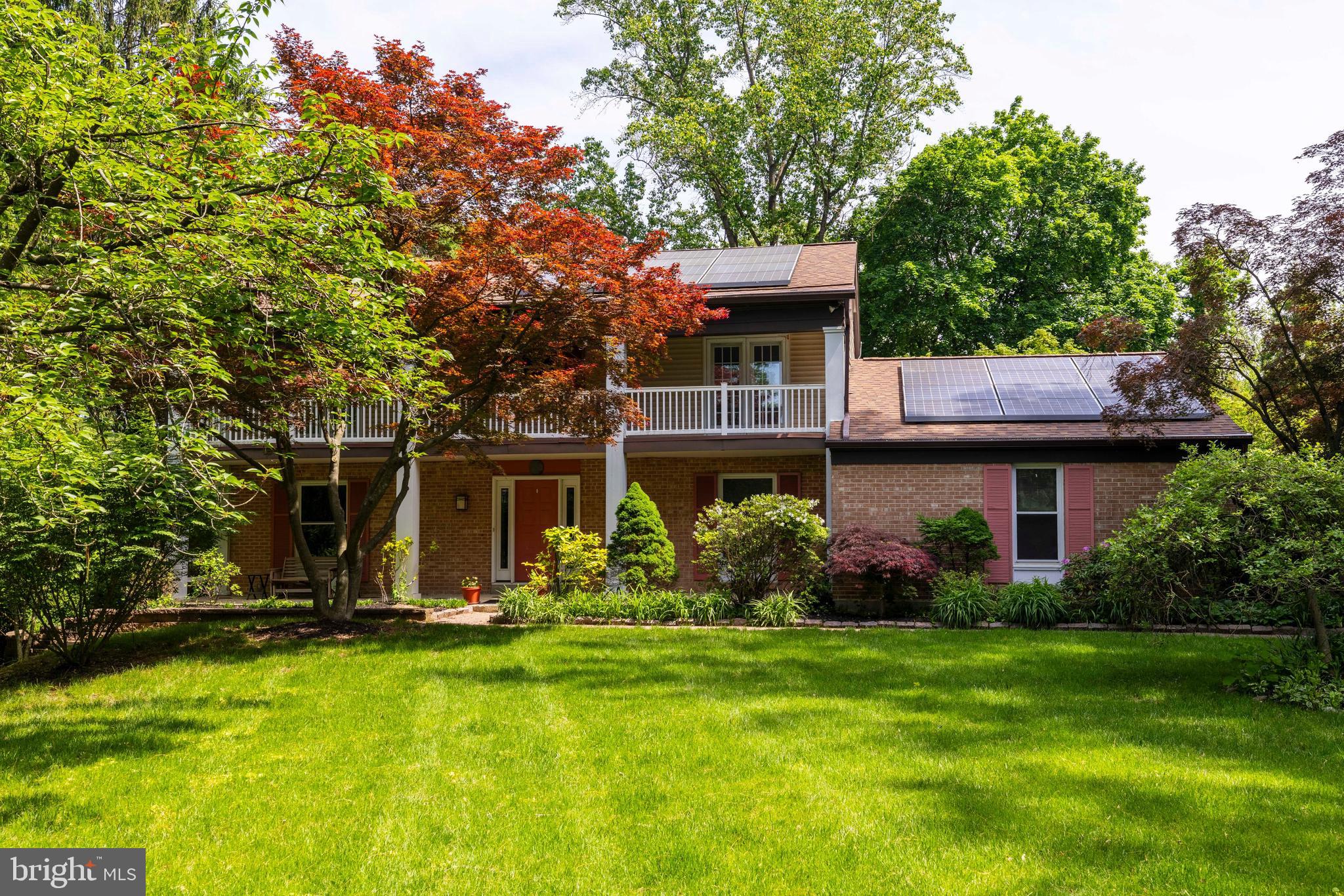 Fabulous Opportunity! Nestled in a lovely setting on a quiet cul-de-sac in the desirable Gulph Mills neighborhood, this spacious brick Colonial is loaded with possibilities. A full front porch is truly welcoming as one approaches the property. The bright entry hall leads to a large living room with a brick fireplace. Celebrate meals with family and friends in the adjacent formal dining room. The eat-in kitchen features granite counters, ample cabinet space, bay window and breakfast bar. The family room has sliders to the back deck, providing wonderful indoor/outdoor space. The deck overlooks the lovely landscaped grounds and oversized hardscaped patio. An inground pool provides the perfect place for family fun and relaxation. The laundry room with built-ins and powder room complete the first floor. The second floor includes a gracious primary bedroom with en-suite tiled bath, walk- in closet/dressing area and access to the front balcony, plus three additional ample sized bedrooms and a renovated full hall bath. The large recreation room with fireplace, located in the nicely finished lower level, provides space to play or entertain. Two other finished rooms and an added full bath can be used for a home office or additional living space. An added plus is the solar panels, which lower the electric bills. Lovingly cared for, this home is ready for you to make your own. Convenient location, close to shopping and transportation. A must see!