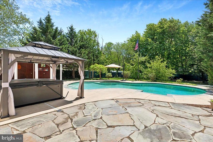 Step into exceptional space, comfort, and versatility in this impressive home offering over 5,200 square feet under roof and a layout designed to elevate everyday living.
The main level is both inviting and expansive, featuring beautifully refinished hickory hardwood floors, fresh paint throughout, and brand new carpet for a crisp, updated feel. Multiple living spaces create the perfect balance of openness and function, highlighted by a massive family room and a sun-filled morning room that overlooks the backyard oasis. Natural light pours in, creating a warm and welcoming atmosphere that is ideal for both everyday living and entertaining. The galley-style kitchen is a true workhorse, complete with a 6-burner stove, stainless steel appliances, and granite countertops, all seamlessly connected to the main living areas.
Upstairs, you will find five generously sized bedrooms and two full bathrooms, including a standout primary suite that feels like a private retreat. This expansive space features a separate sitting room or office that can be tailored to your lifestyle, whether as a private home office, reading lounge, fitness area, nursery, or even a quiet media space to unwind at the end of the day. The suite also includes two walk-in closets with one offering its own dedicated laundry area, along with a large ensuite bathroom designed for comfort and convenience.
The lower level offers incredible flexibility with a second kitchen, a spacious open living area, its own laundry area, and plenty of storage. With a private entrance, this space is perfectly suited for an in-law suite, guest quarters, or a studio setup.
Stepping outside brings you to the highlight of the home.  Experience your own private escape in the backyard oasis - built for unforgettable gatherings, featuring a saltwater pool, hot tub, and cabana that set the stage for everything from laid-back afternoons to lively evenings. Host summer pool parties, unwind in the hot tub under the stars, enjoy outdoor dining and drinks at the cabana, or set up games and lounge areas for guests to relax and connect. Whether it’s weekend barbecues, celebrations, or quiet nights with friends and family, this space is designed to make every moment feel like a getaway.
Ideally located near major commuter routes and benefiting from upcoming road improvements, this home offers both convenience and future upside. Located within the Broadneck school district with easy access to commuter routes and local amenities.  This property delivers the space, features, and lifestyle today’s homeowners are looking for - schedule your appointment today!
