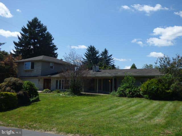 Priced over $20,000 below Appraised Value!  A lot of house for the money! One-of-a-kind home in super East York Location.....Minutes to I83, Rt30 and tons of conveniences! Roll up your sleeves, bring your tool belt and paint brushes, to turn this diamond in a rough into something to cherish. Unique floor plan allows for flexibility when planning how to live in it. There's even the possibility of separate living quarters (previous owner used it as a private residence and group home). Window walls and soaring ceilings add a sense of spaciousness. Hardwood floors (might be under carpet too), double-sided gas fireplace, family/game room or 5th bedroom, large 4-seasons room with bar area overlooks in-ground pool and patio area. Finished garage with bonus storage areas and built-ins. Laundry hookups on 1st floor in lower level. Room to expand in lower level. AGENTS-SEE AGENT REMARKS!