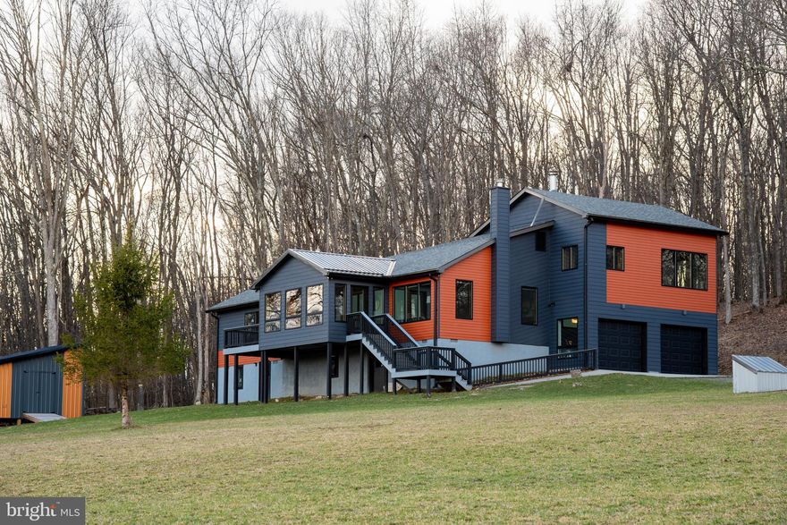 Escape to your own private mountain retreat! This contemporary 2-bed, 2-bath home is perfectly situated on approximately 84 acres of pristine land, offering breathtaking views overlooking a picturesque 7-acre field. Expansive windows, high vaulted ceilings and an open layout maximize the stunning scenery, allowing natural light to flood the space. Whether you're seeking a peaceful getaway, an outdoor enthusiast's paradise or your primary home with stunning views, this property offers endless opportunities for relaxation and adventure. With unfinished square footage ready for your personal touch, there's room to expand and make this modern mountain retreat truly your own. Don’t miss this rare chance to own a slice of paradise!