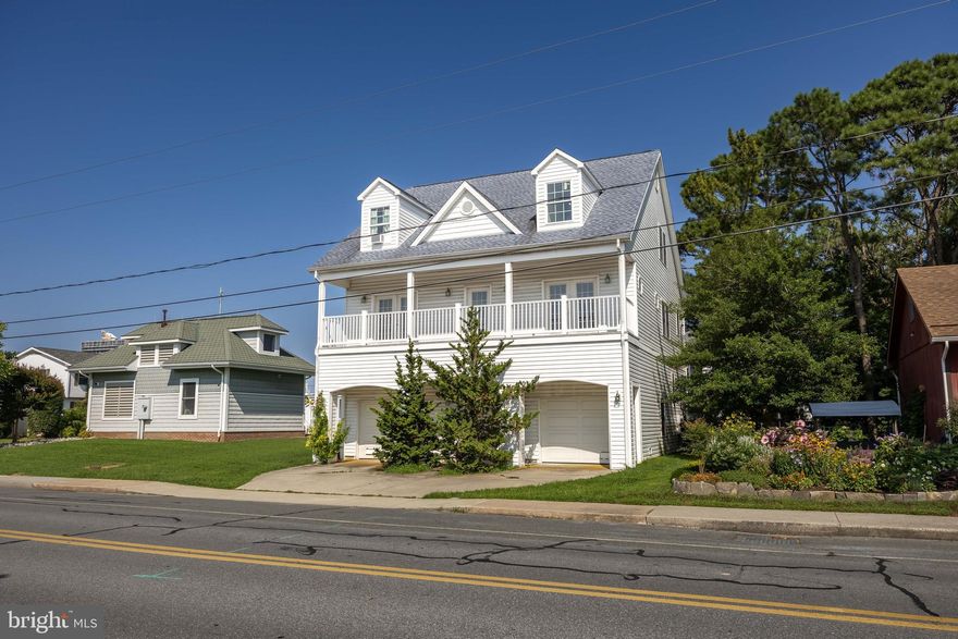 Welcome to this spacious 4-bedroom, 3.5-bath coastal-style home nestled in one of Ocean City’s most sought-after neighborhoods. Just a few blocks from the beach and close to parks, the Ocean City Art League, grocery stores, and an array of dining options, this home offers the perfect blend of space, location, and potential.

Designed with comfort and functionality in mind, the home features main living on the upper two levels, while the ground level offers two single-car garages, a full bathroom, laundry room, and abundant storage. An interior stairwell leads to the second floor, where you’ll find two generous bedrooms connected by a Jack and Jill bathroom, a convenient powder room, and a bright open-concept living space with high ceilings, a gas fireplace, and a spacious kitchen and dining area.

Step out onto the large balconies and enjoy soothing ocean and bay breezes—ideal for morning coffee or sunset cocktails. The third floor boasts an oversized loft with two additional bedrooms and a full bath, providing plenty of room for family, guests, or home office space. Some porches even offer peek-a-boo water views, adding to the coastal charm.

With plenty of square footage and flexible living areas, this property is ideal as a full-time residence, second home, or vacation retreat.

This is an estate sale and the home is being sold as-is. Priced under market value, it presents an outstanding opportunity to build equity with cosmetic updates. A true diamond in the rough just waiting for your vision to bring it to life!