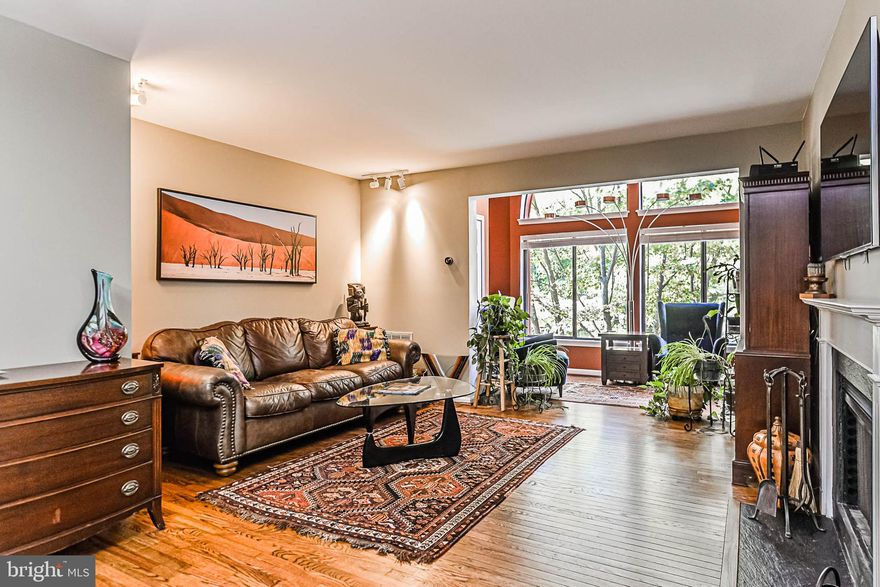 Top Level Condo with High Ceilings in Sunroom boasting a Treed View / Beautifully Refinished Hardwood Floors / Newer Stainless Steel Appliances / Granite Counters / Stainless Steel Full-Size LG Washer & Dryer / Newer Carpets in Bedrooms / Newer HVAC & Programable Nest Thermostat /  Renovated Bathrooms / Wood Burning Fireplace / Well Maintained / Lee Oaks is wonderful community featuring an Outdoor Pool, Club House / Mclean High School Pyramid / Fabulous Location: Under 2mi to Mosaic District Under 2mi to Falls Church city / Close to Metro / No fuss parking, this unit has 1 resident & 2 visitor parking permit tags / Available for new tenant move-in August 10,  2024