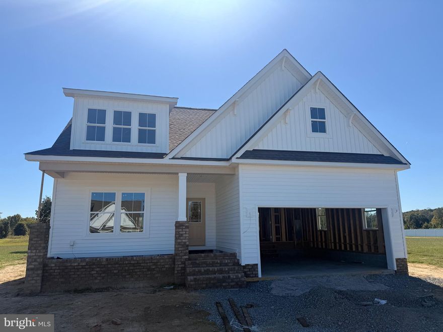 Under Construction! Welcome Home to the Powell! Estimated completion: end of December. Located in the desirable Hobbs Hole Section II, this home sits in the heart of Tappahannock along the scenic Hobbs Hole Golf Course. Enjoy beautiful, level lots with optional golf course views—an ideal location to build your dream home. Built by RCI Builders, the Powell features 3 bedrooms 2 full bathrooms downstairs and a finished upstairs—featuring a spacious 4th bedroom, full bathroom, and a walk-in attic for convenient storage. This open-concept floor plan includes a two-car garage with a paved driveway, rear deck, and a screened-in porch perfect for relaxing or entertaining. Inside, the kitchen, dining room, and family room flow seamlessly together, with a vaulted ceiling for an even more open feel. The kitchen includes a peninsula with bar seating, pantry, and plenty of prep space. The owner’s suite boasts a large walk-in closet and a private bath with double vanity and stand-up shower. Photos are of the RCI Powell Model and may not reflect the exact finishes or layout of the home being built.