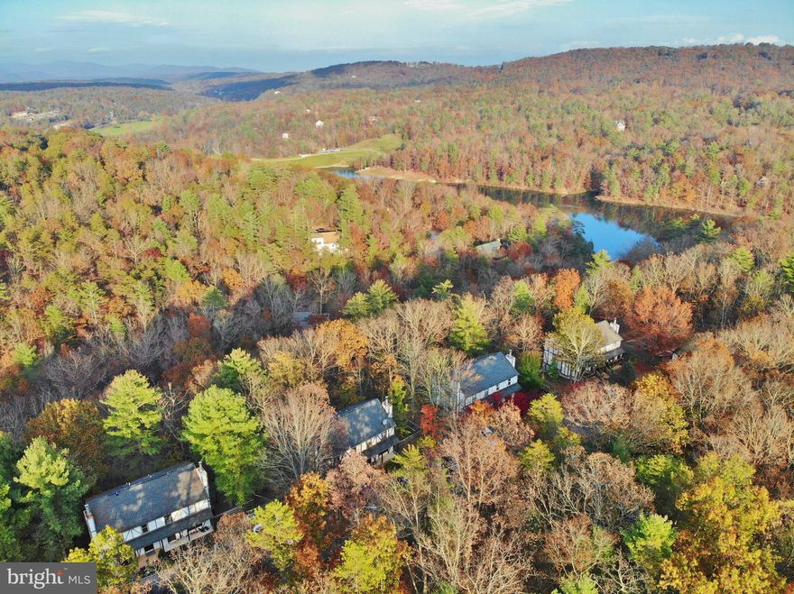 1,810 Square Feet  - "The Escape Weekend" A bright and airy town home nestled close to Bryce Resort - Walk to the back side of the lake - Drive 6 minutes to the Bryce Resort Club House. This 4BR/4&1/2 Bath home is ready for you to enjoy - Maple cabinets - Lower level replacement windows - Pellet stove  - Furnished with reason offer.  Lower level has potential income which has an efficiency kitchen, bath, bedroom and living room with private entrance. You enjoy the top two levels and rent the lower level - Full time or part time -  Your choice -. Enjoy Skiing/Tubing/Ice Skating/Golf/Zip Line/Club House/Restaurants/Indoor Salt Water Pool/Fitness Center/Outdoor Pool/Tennis Court/Play Ground. The best of all is our lake - Enjoy swimming, boating and fishing.  Grab your suitcase and get away from the city.  Only 1.5 hours from NVA down 81 South. Don't forget Orkney Springs (Shrine Mont) is only 5 minutes away - Enjoy concerts, hiking, pond, labyrinth and the famous Orkney hotel. Don't miss out on this outstanding value.