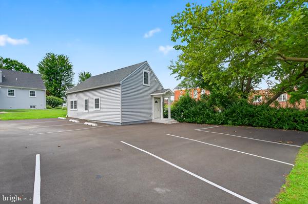 This rental has been totally gutted and remodeled and is ready for immediate occupancy. Situated in the back of the home on Belair Road, you will love the privacy and views for this commercial site which is a separate building. Two floors and perfect for a small business such as accounting, insurance, real estate or any other professional use. Full kitchen and bath, beautiful wood plank flooring, new windows and more. Looking for one year or more lease.