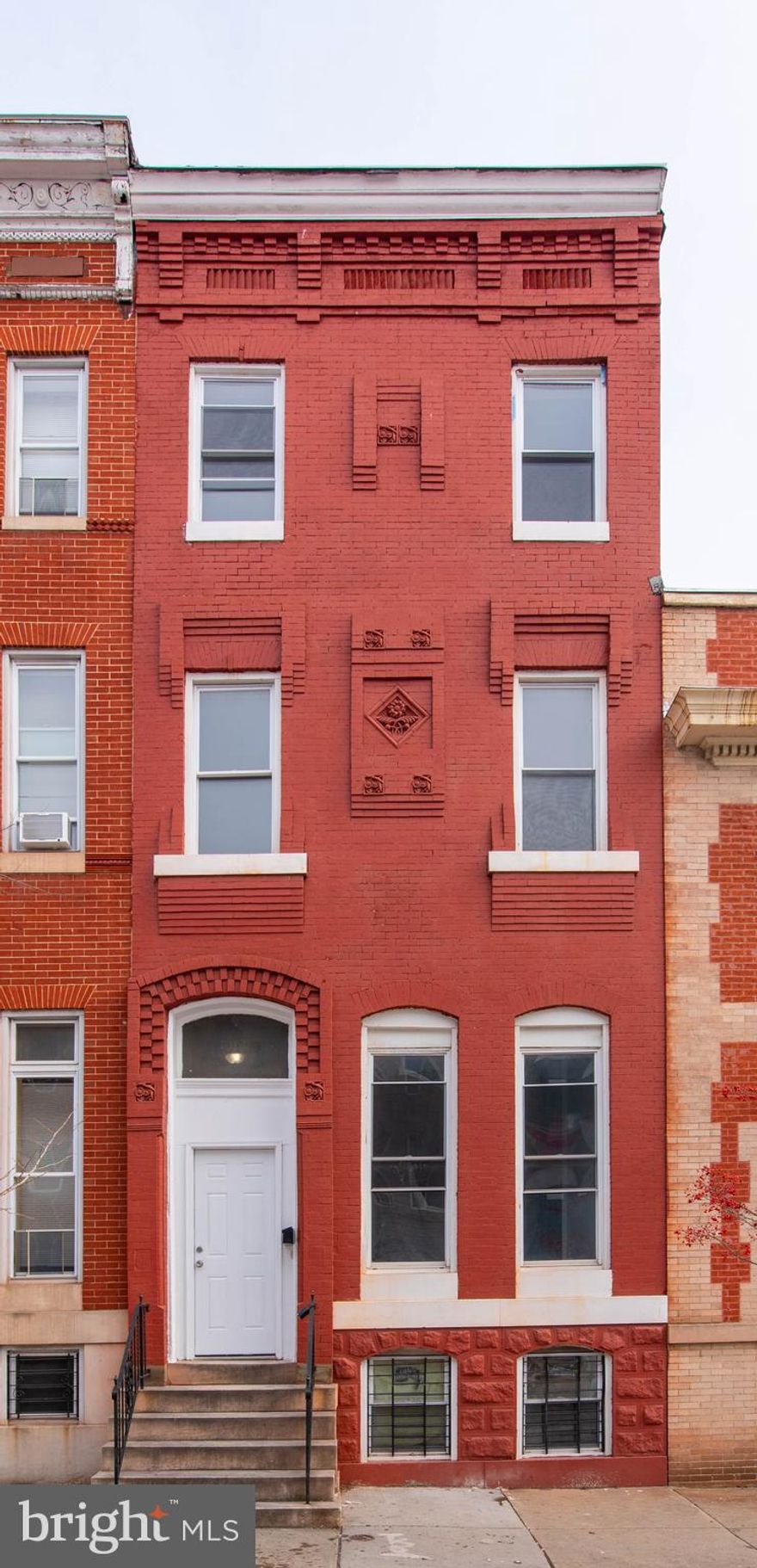 List price to be opening bid.  Online auction to be conducted on Auctioneers website. Online only auction. Online registration & bidding begins Thursday, July 6th and ends Tuesday, July 11, 2023 at 11:30AM.  Large brick-front townhouse w/4-Levels in the "Druid Heights" neighborhood of Baltimore City with 5 bedrooms and 2 1/2 baths.  The property is currently tenant occupied with a Section 8 tenant. Approx. above grade living area of 2,462 +/- sq. ft. Current gross monthly rent: $2,000. Current gross annual scheduled rent: $24,000.  HABC HAP payment starting July 1, 2023 and subsequent months is $2,000 per month; tenant pays $0. Tenant pays BGE. Owner pays water. Main level - includes an entry way, living room, dining room, 1/2 bath and kitchen. Upper  level 1 - includes 3 bedrooms & 1 full bath. Upper  level 2 - includes 2 bedrooms & 1 full bath. Lower level - is unfinished and includes washer/dryer hookups, plenty of storage and the mechanical systems for the house; forced hot air heat and an electric hot water heater. 
Location: The property has a convenient location near dining, shopping, schools, recreational facilities, and access to transportation routes. The townhouse is located just to the west of the Bolton Hill neighborhood and north of mid-town and downtown Baltimore; and just south of the Reservoir Hill neighborhood.  The Jones Falls Expressway is nearby.  Features Include: 2 interior stairways in the front and rear, going up from the main level, Central A/C, Laminated Wood Floors on the main and 2 upper levels, Fenced-in backyard, Approx. above grade living area of 2,462 +/- sq. ft. (according to SDAT)
Faux fireplace, Brick interior wall on main level.  Sellers comments: the property had a full gut rehab and restoration in 2015.  The property was updated again in late 2021 before the current tenant moved in. 
Note: The pictures were taken by ACA in February 2022, shortly before the current tenant moved-in to the property.