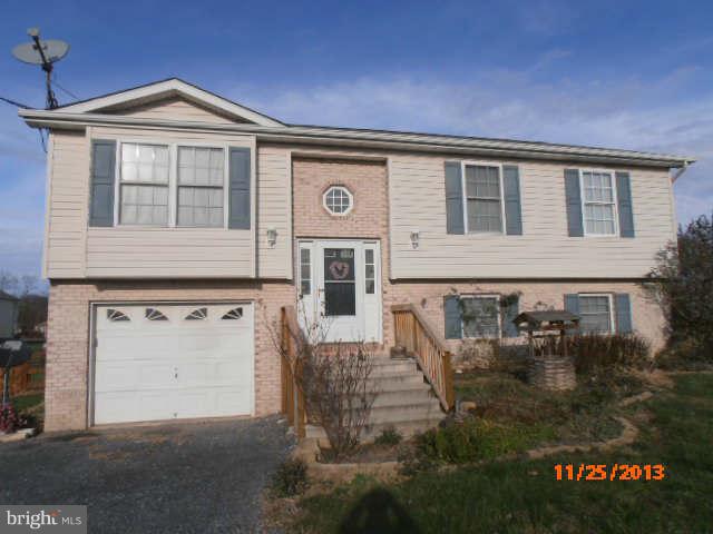 Exceptional corner lot. Fenced back yard that is nice & flat. Perfect for children or pets. Rear deck for your outdoor entertainment. Established trees and shrubbery in the front yard. Garage is large enough for a workshop. Basement has a full bath, bedroom and family room. kitchen adjoins dining room and living room. Three full baths. Minutes from I 81. Close to shopping & schools. Move in ready.