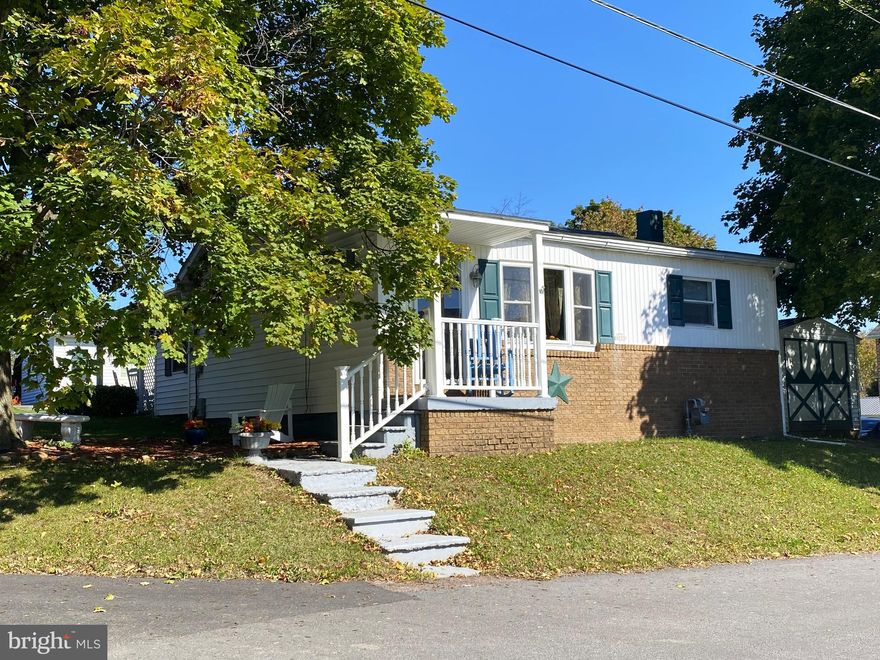 What a unique property!  Live in the main house, while renting out the adjacent apartment.  The main house has around 1,142 sf of living space, and contains three-bedrooms and one bath.  The apartment has around 576 sf of living space, and contains two-bedrooms and one bath.  Enjoy the oversized living room, while entertaining in the kitchen that is open to the dining area.  Relax on the large covered back porch, then go swimming in the in-ground pool.  The apartment has an open floor plan, with laundry and two large bedrooms.  The property also features a garage and storage shed.  When you call Allegany County home, the mountain views are majestic.  Call Today for a Tour!!!