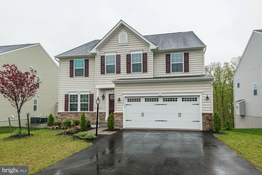 MASSIVE PRICE REDUCTION! MOTIVATED SELLERS!  Over 4160 sf. of living space on a premium home site, backing to lush tree save area. Gorgeous wide plank hardwoods on the entire main level & stairs, home office on the main floor, high end finishes throughout kitchen & all baths,In house Bluetooth entertainment system, lower level recreation room finished w/walk out, VIRGINIA MANOR HOA & AMENITIES