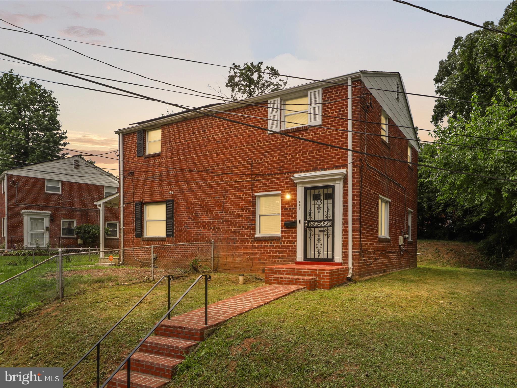 Price Improvement. This move-in ready 2BD/1BA townhome blends charm with stylish upgrades. The renovated kitchen features stainless steel appliances, sleek backsplash, and updated cabinetry and countertops. Enjoy fresh interior paint, a new stackable washer/dryer, and a refreshed bathroom. The exterior brick steps were renovated in 2025, and the seven-year-old roof remains in excellent condition. Step outside to a generously sized backyard and enjoy convenient street parking right out front. Located with easy access to commuter routes, parks, shopping, and public transit. Schedule your private tour today!