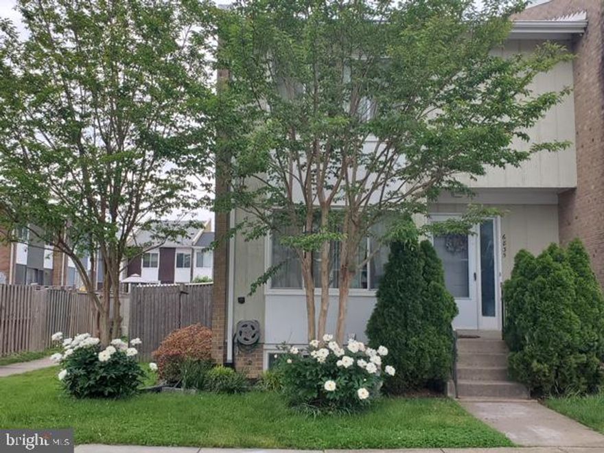 Opportunity awaits! End-unit townhouse priced 25k below appraised value. Bring your paint brush and design ideas and make this home your own. Home features wood floors on main level and carpet in bedrooms. Fully finished basement with a full bath Terrific fully fenced in yard ready to become your summer oasis. Shed conveys.  Home will be sold "AS IS".