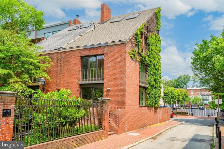 This is the home you've been waiting for! OVER $300K IN UPGRADES! Welcome to 301 Cypress St., a corner contemporary brick home in Cypress Square in Society Hill. This 3 Bedroom, 3 Full and 1 Half Bath property with 2 CAR GARAGE has been completely reimagined and renovated in the last 18 months.  This unique, light-filled contemporary home showcases an open floor plan on the main level. The entry foyer opens to a bright and efficient Kitchen with white cabinets, granite countertops, glass tile backsplash and stainless steel Bertazzoni appliances. The spacious Living and Dining Room features a  wood burning fireplace and large sliding glass door to a private outdoor Patio, with steps leading to the 2 car Garage. A Powder Room and large coat closet complete the main level. A unique sculptural staircase leads to the second floor, with a large Bedroom with fireplace and sliding doors to a Juliette balcony. A completely new Bathroom can be used as an en-suite or accessed from the hall. A second Bedroom, with cathedral ceiling offers lovely views of Cypress Square. The third floor features the spacious Primary Bedroom Suite with soaring cathedral ceiling, fireplace and sliding doors to a second Juliette balcony. The en-suite Bathroom offers an oversized shower and large vanity. A walk-in Closet has been thoughtfully designed with custom cabinetry. The bonus Lower Level with full Bathroom offers infinite possibilities for additional living space, bedroom, office, gym or home theater. An additional unfinished area provides lots of storage space and a Laundry area. Among the many updates are a new roof, new windows, new HVAC, newer water heater (2019), new hardwood floors, new kitchen, new bathrooms, new recessed lighting, new ceiling fans, new garage door. This fabulous property is conveniently located within walking distance of charming 3 Bears Park, close to restaurants, shopping and easy access to I-95.