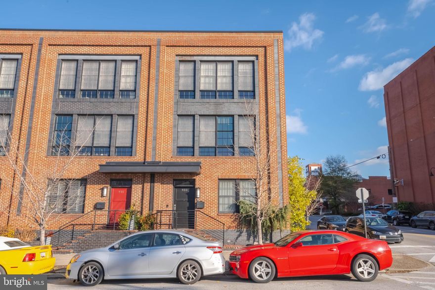 VA ASSUMABLE MORT  3.5 % INTEREST RATE, PAYMENT $2,779. INTEREST PAYMENT, MONTHLY, WHY GET A FULL MORTGAGE WHEN YOU CAN ASSUME 3.5% FIXED  FOR  BALANCE OF LOAN. SELLERS HAVE PAID DOWN 7 YEARS ALREADY. Don't Pay 7.0 %  Brick End-Unit Townhome with Rooftop Deck Welcome to your dream home in the heart of Brewers Hill! This  brick townhome combines modern elegance, urban convenience, and unbeatable city views. Whether you're entertaining guests or enjoying a quiet evening, this property offers it all—including a coveted 2-car garage, a rare luxury in city living.Key FeaturesConvenient Entry-Level Living:2-car garage for secure parking.Third bedroom with a full bath, ideal for guests or a home office.Bright & Spacious Main Living Area:
Towering 9-foot+ ceilings and oversized windows provide extraordinary natural light year-round.
Gourmet kitchen featuring:
Large center island with seating.
Stainless steel appliances.
Generous pantry.
Granite countertops and stylish pendant lighting.
Open dining area with space for a large table.
Living room with a charming exposed brick wall.
Elegant Upper Floors:
Primary Suite Retreat:
Walk-in closet.
Luxurious en-suite bath with double vanities, oversized shower, and a soaking tub.
Additional bedroom and full bath down the hallway.
Convenient stacked laundry located on the upper floor.
Rooftop Deck Oasis:
Spectacular views of the Patapsco River, Inner Harbor, downtown skyline, and beyond.
Perfect for hosting or watching fireworks displays on the 4th of July!
Prime Location
Situated in Brewers Hill, this home is just steps away from:
Locally-owned restaurants and cafes.
Shopping boutiques.
Beach volleyball and pickleball courts.
Spin and yoga studios.