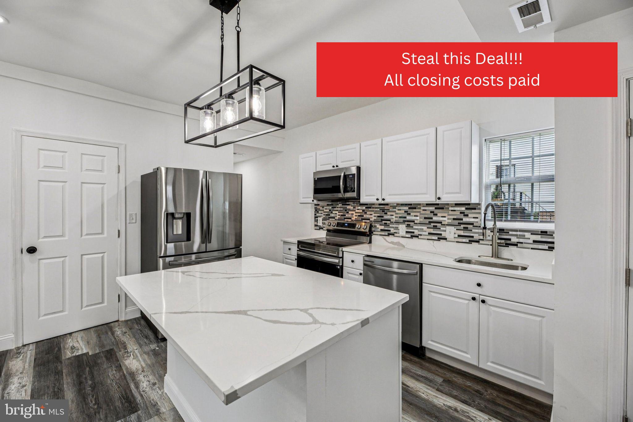 * * * * * * * JUST REDUCED * * * * * ALL OFFERS CONSIDERED! BRING YOUR BEST OFFER!!! Unbelievable price reduction on this exceptionally beautiful, fully remodeled home in the heart of Baltimore. Welcome to luxury living in Baltimore. Step into a beautifully renovated 5-bedroom 4-bath home in Baltimore, where every detail has been meticulously crafted for modern living. This home has been upgraded from top to bottom, with all necessary permits pulled for the installation of new electrical systems, plumbing, and HVAC. With its inviting porch front, this charming residence boasts 5 spacious bedrooms and 4 bathrooms, including a master suite on the second floor with a combination of a stunning freestanding tub and a separate shower which is perfect for unwinding in style. Kitchen is stacked with high-end fixtures, energy-efficient appliances, and an open floor plan to create an atmosphere of luxury and comfort. The chef-inspired kitchen features stainless steel appliances, sleek quartz countertops, a 5-burner electric stove with an over-the-range microwave, a custom backsplash, and an energy-efficient Samsung refrigerator. The main level offers a generously sized living and dining area, a powder room, and an exterior door leading to a private deck. Upstairs, you'll find three large bedrooms, each serving as a peaceful retreat from the hustle and bustle of daily life. The master suite is truly a sanctuary, complete with an elegant en-suite bathroom. The fully finished basement adds even more living space, offering endless possibilities. With two additional bedrooms, a full bath, and a recreational area, the basement is ideal for hosting guests, creating a home office, or potentially generating rental income. It’s the perfect balance of functionality and flexibility. Additionally, the home features a 4th-level attic space with over 500 sq. ft. that can be converted into an extra bedroom, home gym, or recreational area, allowing for further customization. The backyard is fully fenced for added privacy, and the deck provides the perfect space for outdoor entertaining or enjoying summer activities. This home truly exceeds expectations with its impeccable renovations and unbeatable location. Located just outside the heart of Baltimore, this home is only minutes away from downtown, offering a wealth of dining, shopping, and entertainment options. Nearby attractions include the Baltimore Port, Horseshoe Casino, Johns Hopkins Hospital, UMBC, and more. By completing Baltimore City homeownership counseling, buyers may qualify for various grants and down payment assistance programs—be sure to check eligibility with your lender. Don’t miss out on this extraordinary opportunity to own a luxurious home in a prime location!