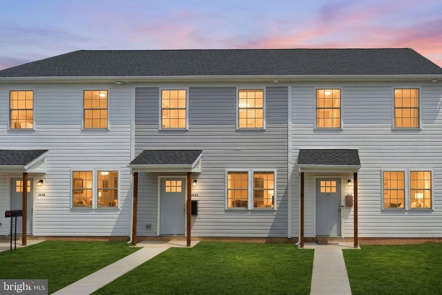 Beautiful constructed townhome with 9-foot ceilings, spacious living room, eat-in kitchen, 36" white kitchen cabinetry, great breakfast bar, and luxury vinyl laminate floors.  Double hung windows & French doors provide lots of natural light. Second story laundry room features a newer washer and dryer. Electric heat pump and central A/C.   Great private fenced in back yard, with a covered patio and garden shed.  Off street parking for 3 cars.  No HOA.   Home is located within walking distance to the grocery store, short drive to shopping, restaurants, schools, library, and entertainment.   Great location & low maintenance.