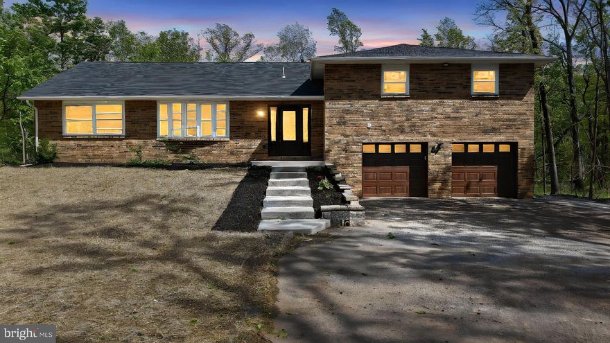 Don't miss this rare opportunity for a FULLY RENOVATED home  in Upper Black Eddy,  Bucks County! Don't let it fool you from the front, this home is BIGGER than it appears. 3,336 sq ft of living space, 5 bedrooms, 3.5 bathrooms and a 2 car garage. Use the 5th bedroom as an inlaw/guest suite or a private office with private outdoor entrance. Four levels of living space including a main floor bedroom with en suite bathroom/private entrance/patio and a second primary suite on the top floor with en suite bath and a walk in closet. In total this home boasts 5 bedrooms (2 with en suite bathrooms), 3 full bathrooms, 1  half bathroom and an open concept that will WOW you! When you enter the front door the enormous open concept space is a blank canvas to make your dream a reality. The gourmet chefs kitchen boasts an oversized natural wood island with seating for 6, pendent lights, recessed lighting, granite counters with backsplash, stainless steel appliances and farmhouse sink, soft close high key white cabinetry, french doors leading to the rear patio and open to the fireplace nook. The formal dining area is in the front of the home blending seamlessly into the living space and the foyer. Completing the main floor is a powder room with contrasting dark vanity and tile flooring. Upstairs find 4 bedrooms, 2 bathrooms and laundry.  On the lowest level of the home check out the fully finished family room measuring 23x34 with almost 8 ft ceilings.  More of the renovations include a new roof, all new windows and doors as well as a new HVAC system with forced air heat/central air, plumbing, electric service and garage doors. This property is also getting a brand new septic in the back corner of the property.  Let's step outside and image those nights relaxing on the brand new concrete patio or exploring in the woods behind your new home. The lot is 1.75 acres but there are county owned lots adjacent to the state game lands behind your home too. Recently many of the trees were cut back and removed to open more yard area and flood this home with natural light. Life in Upper Bucks County offers a refreshing blend of rural beauty, small-town charm, and convenient access to modern amenities. Rolling farmland, scenic back roads, and preserved open space create a peaceful setting, while welcoming communities nearby provide local shops, dining, and year-round events. Residents enjoy outdoor recreation at nearby parks such as Lake Nockamixon ,  perfect for boating, hiking, and picnicking. The area is known for its strong sense of community, quality schools, and a slower pace of life—yet remains within easy driving distance of Philadelphia and Allentown. Your close proximity to the Delaware River adds miles of tow path trails to walk or bike, fishing and boating in the river. Upper Bucks County location is ideal for those seeking space, tranquility, and a true connection to the outdoors without sacrificing accessibility. Located in the award winning Palisades School District. Also, with an ideal location for commuting into New Jersey, Doylestown or Easton too.  Being offered fully finished and move in ready for the lucky new homeowner with America's Preferred Home Warranty for 1 year.