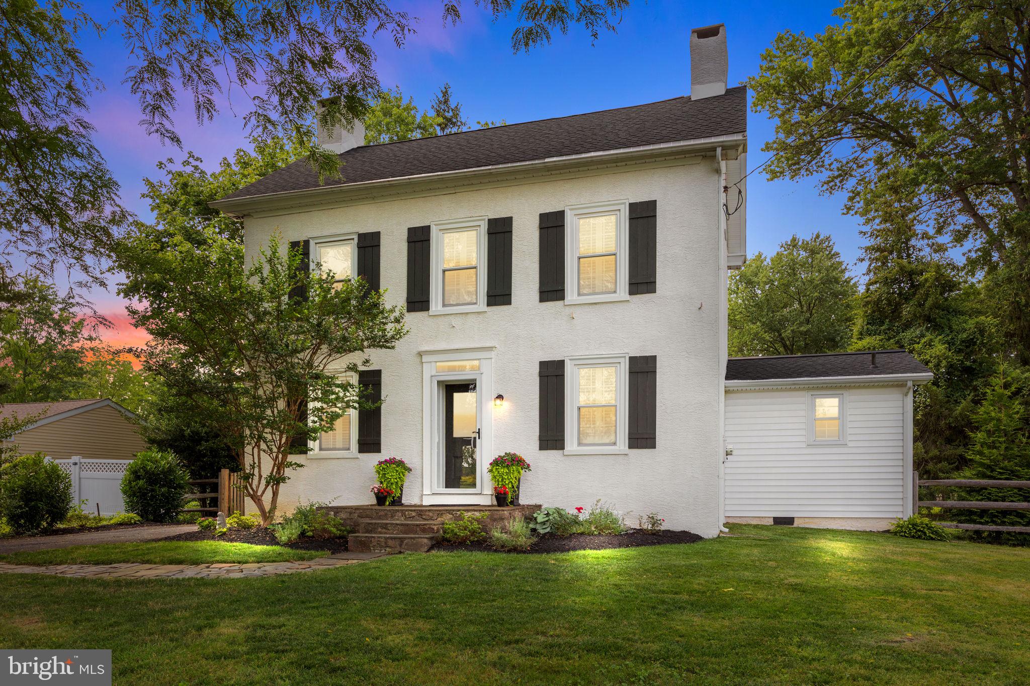 Truly Magnificent, One-of-a-Kind Home! This stunning blend of timeless charm and modern updates in this unforgettable home. From the moment you step inside, you’ll be captivated by the attention to detail and character throughout. The inviting living room features a cozy fireplace framed by custom built-ins and beautifully restored wide plank hardwood floors that flow seamlessly into the elegant dining room, perfect for hosting holiday gatherings and entertaining. The sun-drenched, remodeled kitchen is a dream, showcasing a large bay window with built-in seating, an oversized island, custom cabinetry, a hidden coffee station, quartz countertops, subway tile backsplash, and stainless steel appliances. The kitchen opens to the spacious family room, highlighted by a striking floor-to-ceiling stone accent wall. A beautifully updated full bath and a refinished, extended laundry room complete the main level. Step outside to your private deck and tranquil backyard, ideal for relaxing or entertaining in peace. Upstairs, the curved staircase leads to a showstopping primary bedroom with built-ins. The remodeled hall bath is both spacious and stylish and a walk-in closet you’ll fall in love with . A second bedroom features a charming faux fireplace and ample closet space. The third floor offers a large flex space, perfect for a home office, guest room, or studio along with a third bedroom. As a bonus, the detached barn serves as a two-car garage with additional storage and endless possibilities. With newer roof, electric, and water already in place, the second level of the barn could be transformed into an incredible office, studio, or guest suite. This extraordinary property is a true must see, unmatched in character, charm, and versatility!