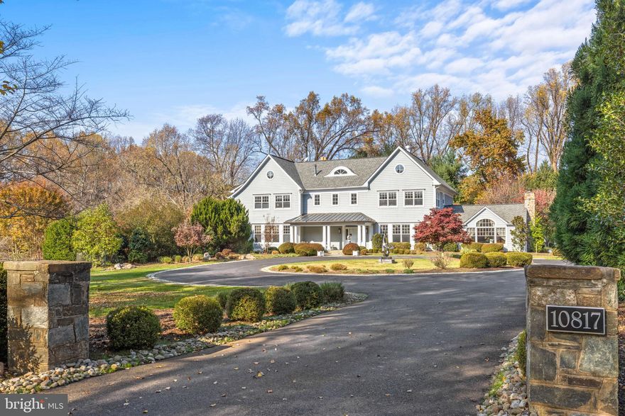 ****Buyer is a commercial broker so the buyers agent commission was waived. The actual price is $3,607,500.*****
Perfectly set on a sweeping private drive in one of the most beautiful and beloved neighborhoods in the area, Potomac Falls, 10817 Stanmore Drive is nothing short of the Dream Home, fully renovated including $1+ million of upgrades by current owners. Attempting to recreate this exceptional home at this price is an impossible task.   This estate is absolutely one of the best values in Potomac.  The main level with rarely available high 10' ceilings throughout boasts an array of conveniences, designed for personalized comfort and luxury living.   This includes a welcoming Two Story Entry Foyer, two private offices with custom built-ins, a main level bedroom suite for multigenerational living, a Formal Living Room and an incredible vaulted ceiling Dining Room/Music Room - a spectacular space for entertainment.  The heart of the home is comprised of the cathedral ceiling Family Room open to the Chef's Kitchen with white cabinetry, quartz counters and backsplash and professional grade appliances plus a breakfast area featuring expansive floor-to-ceiling windows showcasing the scenic views of the rear terrace and backyard.  The custom contemporary slate fireplace in the Family Room anchors the space beautifully.  The updated Gourmet Kitchen includes a professional grade 8 burner gas range and a double exhaust hood for the true chef!  French doors allow for large scale entertaining flowing naturally onto the rear flagstone terrace.  Make sure you don't miss the practical back hallway with the all important mudroom with built-in cubbies and access to the garages.  Upstairs the sumptuous Primary Suite offers the utmost in luxury and comfort, an amazing place to escape and decompress with a cozy sitting room with a gas fireplace, a gorgeous Primary bedroom, two renovated private en-suite baths and dual walk-in closets. The first upper level also has two more oversized Bedrooms with en suite bathrooms and a conveniently located Laundry Room. The top level is the prefect teenager hideaway with a sitting area, large bedroom, renovated en suite bathroom and additional storage closets.  The daylight walkout lower level is an entertainer's haven, featuring a handsome stone fireplace in the recreation room area, a game table/billiard table space and, behind the glass, a state-of-the-art gym with an adjacent renovated full bath and second laundry.   The beauty of the lower level is the access to the immense, level rear yard and pool setting.  The inground heated pool is adjacent to the large level playing field allowing for hours of entertainment for both kids and adults.   Wait till you see this spectacular yard; it is truly one of the BEST in the entire neighborhood.  Invite the lacrosse team over...there is plenty of room for them to practice or if you are looking to relax, sit and sip on the back patio and simply enjoy the view!   This property includes a dynamite separate flexible space over the garage with another renovated full bathroom.  Do you need an art studio, an au pair/in-law suite?  It's all here.  Plus, a five car garage parking.  Just imagine, one of the most coveted neighborhood's in Potomac, a dream home on an incredible 3.6 acre private setting close to the C&O Canal and Potomac Village with easy access to the Clara Barton Parkway and I-495! Churchill school cluster incl. the popular Potomac Elementary. Don't miss this special offering!  (NOTE: Upper 3 Level on Levels is for the Separate Guest House.)