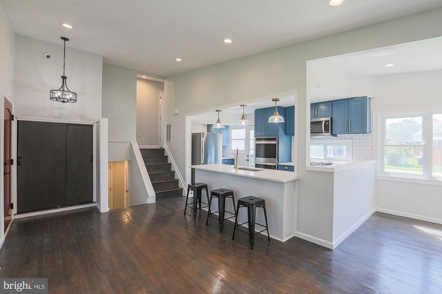 A wonderful 4 Bedroom  3.5 Bath  Pikesville Mid-Century Style home completely transformed with quality features and attention to every detail by Rachel Kessner Interiors.  So much value in this home with new electric and plumbing systems, smart thermostat, ring doorbell security, spray foam insulation throughout and sound proofing attenuation between all bedrooms. The interior is completely new and every inch of the inside and outside has been freshly painted.  Some of the gorgeous design elements begin with the raised square lattice on the Dining Room wall, refinished hardwood flooring, country front door, barn doors and decorative lighting.  The gourmet Kitchen, located central to the Living Room and Dining Room’s open floor plan (perfect for entertaining a large group) has all new stainless steel appliances, quartz countertops, custom back splash, double stainless steel square sink, two dishwashers, double wall ovens, gas cooktop and counter seating.  Three Bedrooms grace the second floor with two spectacular Bathrooms (one being in the primary Bedroom) lots of storage closets, and vaulted ceilings.  The fully finished Basement has luxury vinyl flooring, a Bedroom with egress windows, a full Bathroom with tub and glass enclosure as well as a half Bath with impressive large tiles and bowl sink, a laundry/play area and steps that lead to the private landscaped and level backyard with a concrete patio, special outdoor spot lights, storage shed and long paved driveway.  Nothing is missing from this elegant and unique rental home except you.