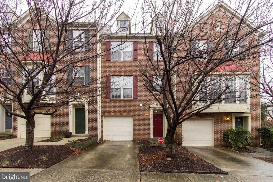 Beautiful brick front townhouse in the Woodview Village Community.  House shows well and priced to sell.  3 levels above grade with a 1 car garage.  3 level bumpout.  Close to shops, restaurants, and beltway.
