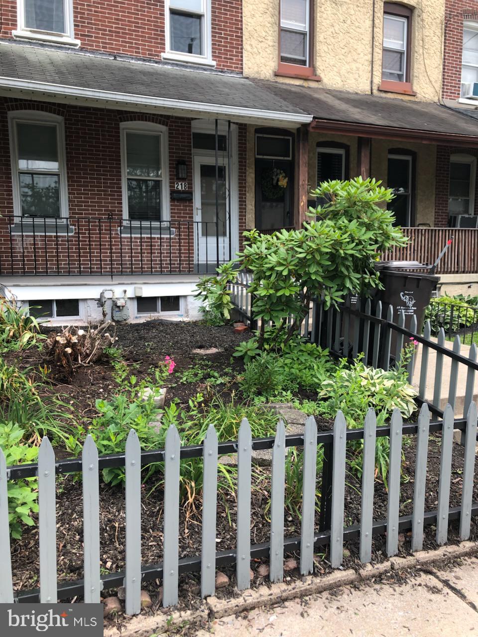 This house is currently rented for $2000.00 per month, but tenants are relocated and will be out by July 31. Welcome to this super clean, 3 story home. Lots of pride of ownership show through at every turn. Walk along the picket fence and admire the front with beautiful plantings. The large covered front porch is a great place to enjoy the pretty front yard. Once inside, you're in the entry vestibule and living room with neutral carpet, freshly painted walls and ceiling fans. Follow through to the kitchen with newer appliances (2023) and solid cherry wood cabinets and countertops installed in 2023, new vinyl flooring (2023, dishwasher and lots of storage. Continue to the back mudroom, with an oversized walk in closet (could easily be converted into a half bath). A rear deck overlooking more gardens of vegetables and perennials. There is also an off street parking spot in the rear. Upstairs you'll find the master bedroom and the office/nursery. The bathroom is extremely spacious with the toilet and tub in one area and the sink and oversized closet in the dressing room area with new cabinets. The 3rd floor houses 2 more large bedrooms. The laundry is located in the basement which offers plenty of storage and cabinets/countertops. Replacement window were done in 2017 and more in 2023. Located in the west end of Norristown, West Norriton is right across the street! Close to major routes, the King of Prussia Mall, and the train station.